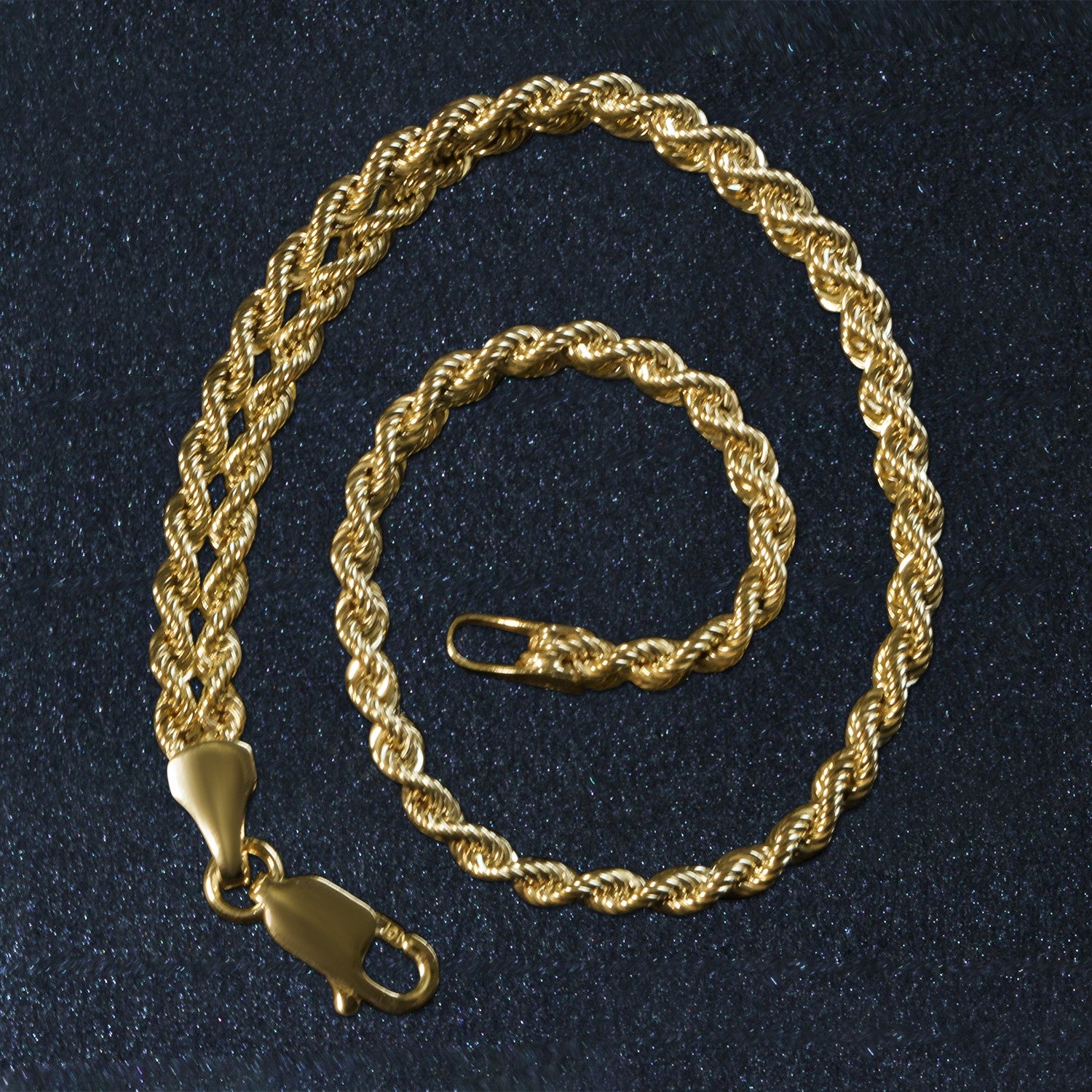 Classic double rope chain bracelet in 10k yellow gold, featuring elegant links and a timeless design.