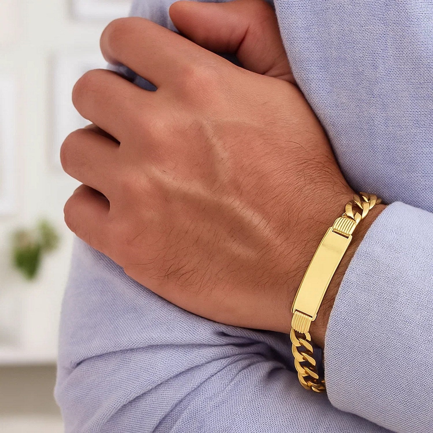 Elegant 14k yellow gold curb ID bracelet featuring a sleek chain design, perfect for luxury jewelry enthusiasts.