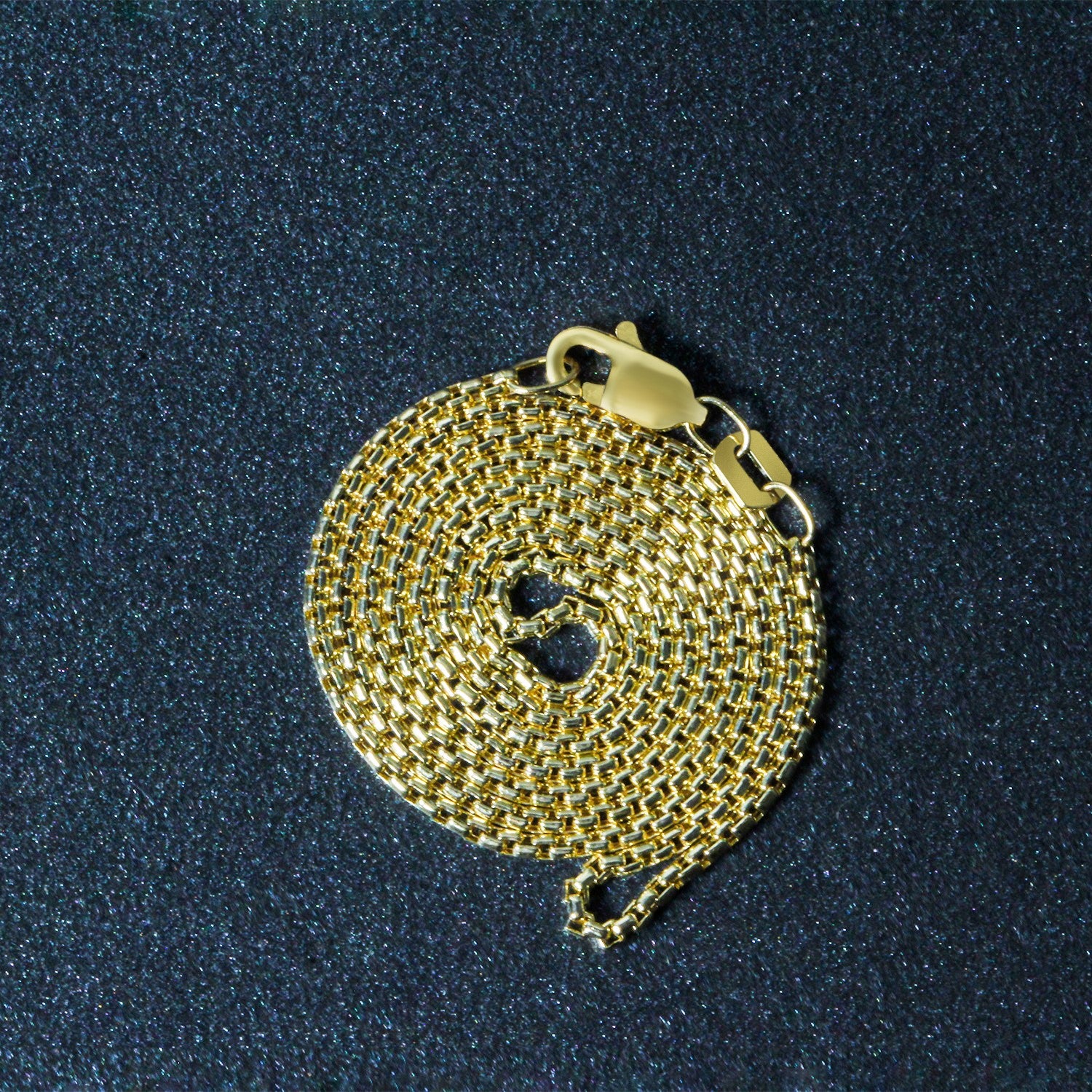 14k yellow gold round box chain, 1.3 mm, showcasing a classic design perfect for layering or standalone elegance.