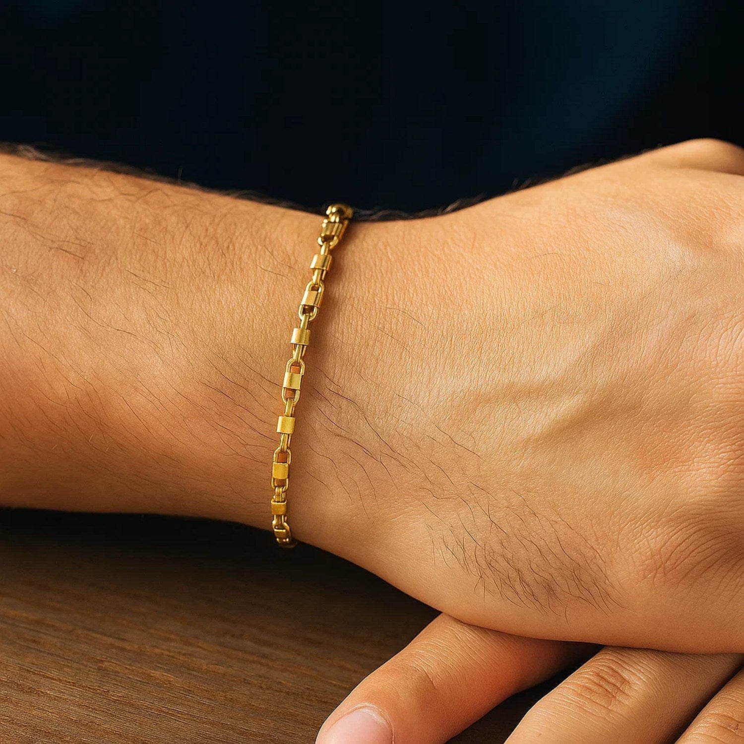 14K yellow gold square Byzantine chain bracelet with modern link design, showcasing luxury craftsmanship and elegance.