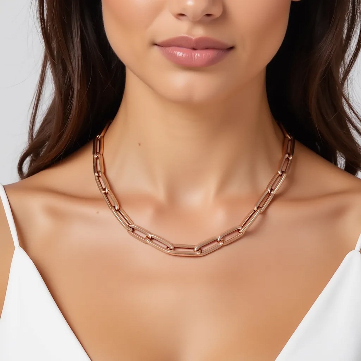14K rose gold wide paperclip chain with modern links, showcasing elegance and contemporary design.