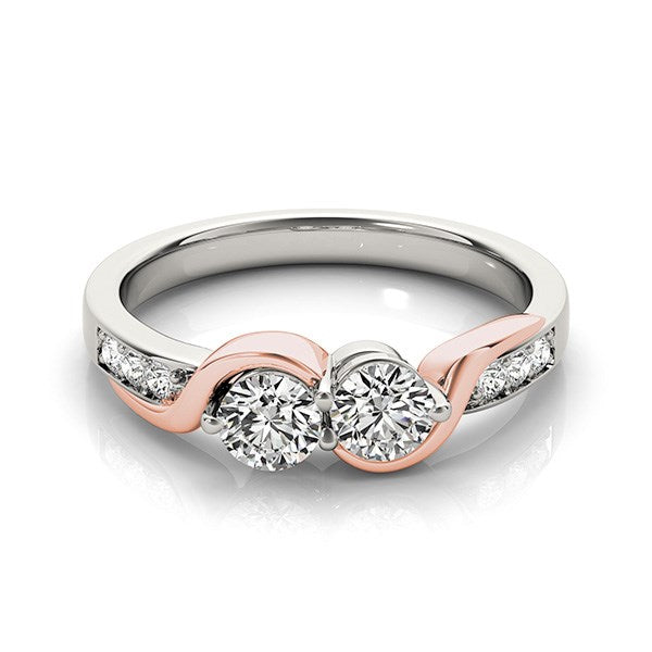Elegant 14k white and rose gold curved band ring featuring two round diamonds, showcasing refined luxury and craftsmanship.