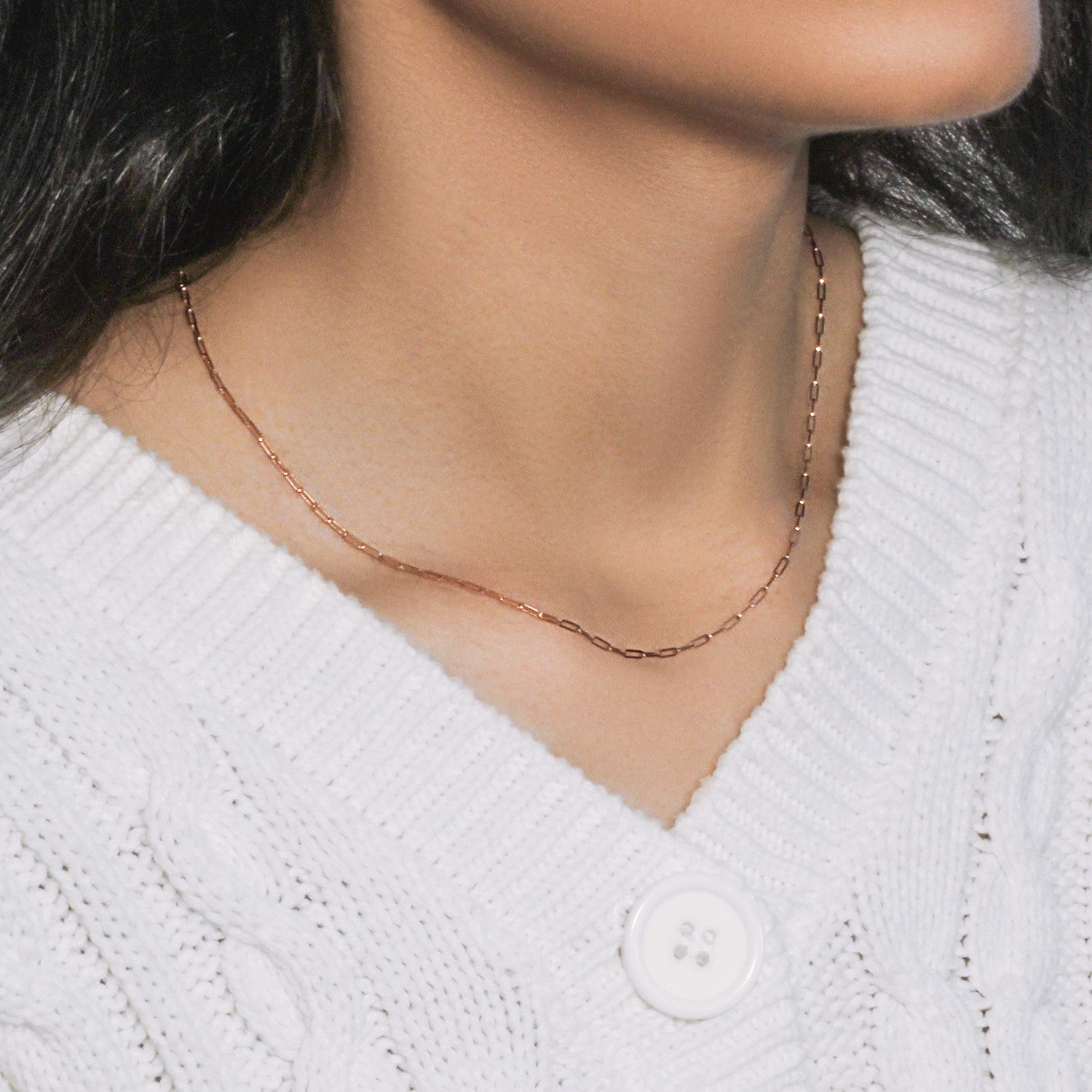 14k rose gold fine paperclip chain with modern links, perfect for layering or as a statement piece.