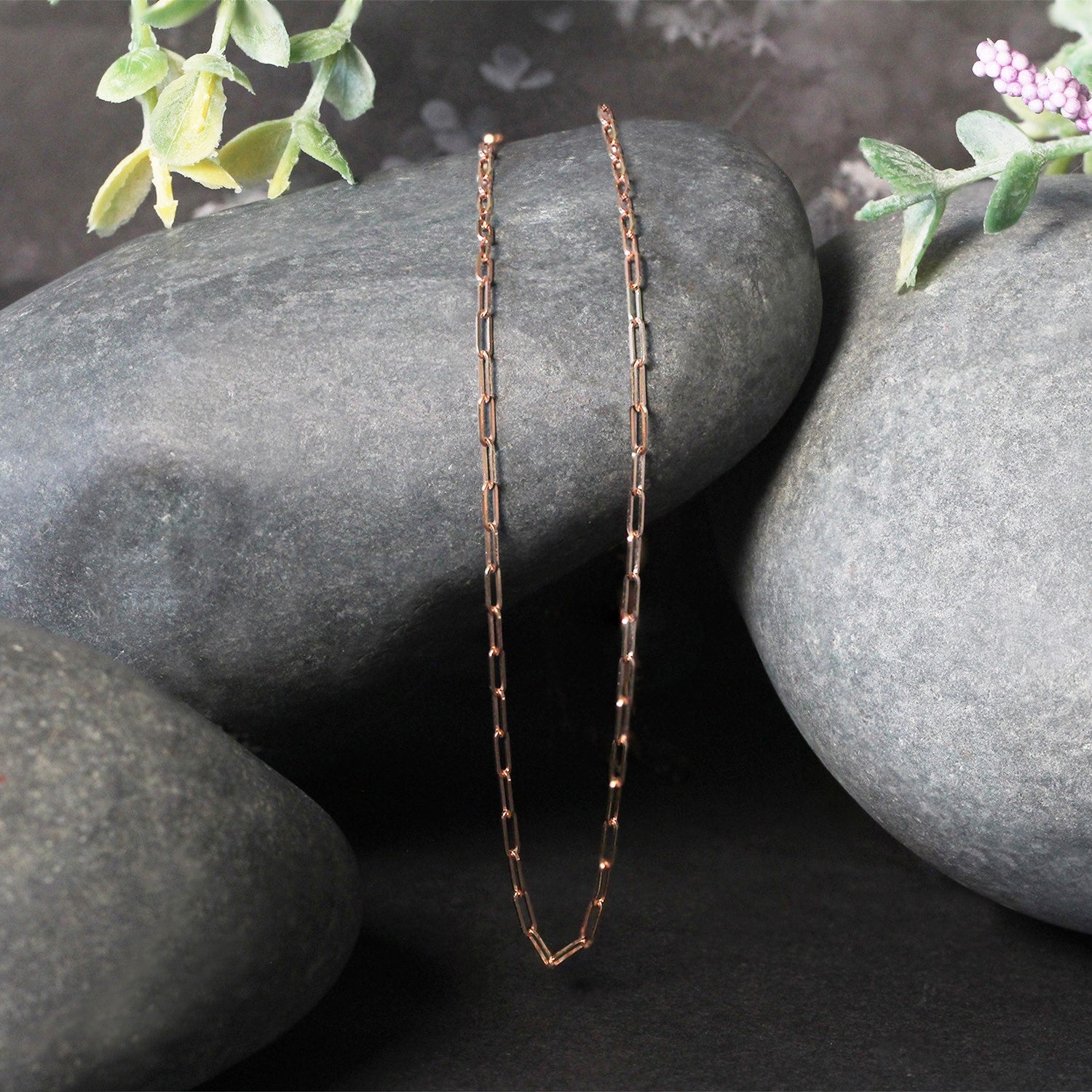 14k rose gold fine paperclip chain, modern design with elegant links, perfect for layering or standalone wear.
