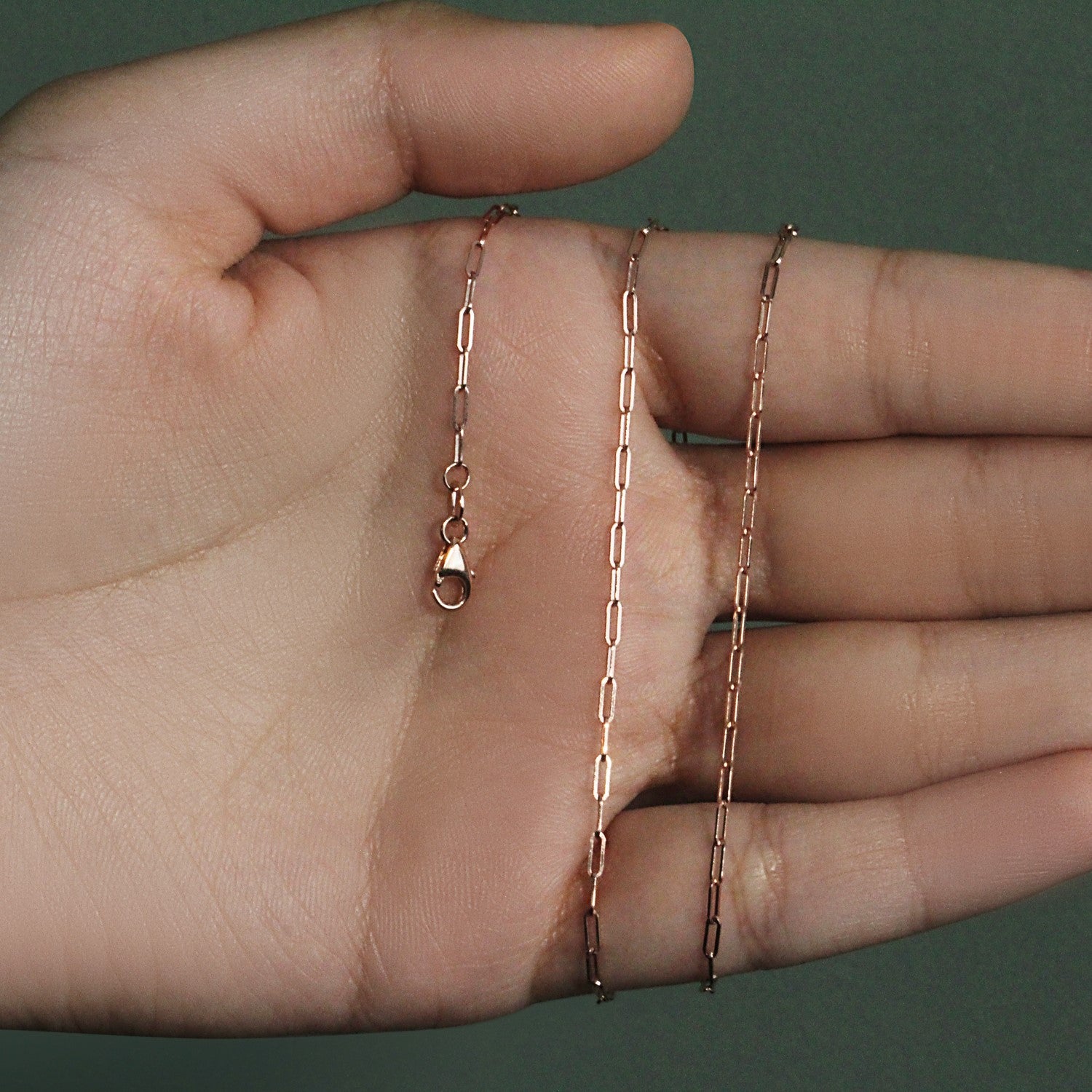 14k rose gold fine paperclip chain with modern links, perfect for layering or standalone elegance.