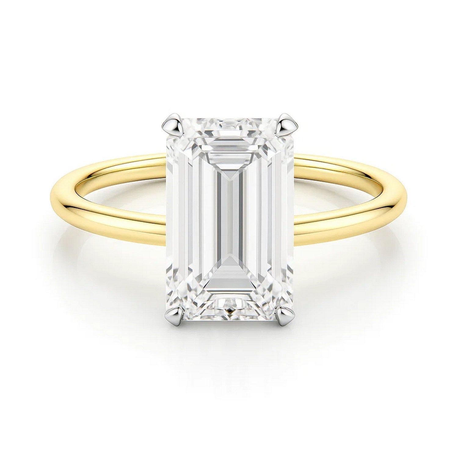 14k yellow gold solitaire ring featuring a 3 carat emerald and IGI G/VS1 diamond, showcasing modern elegance.