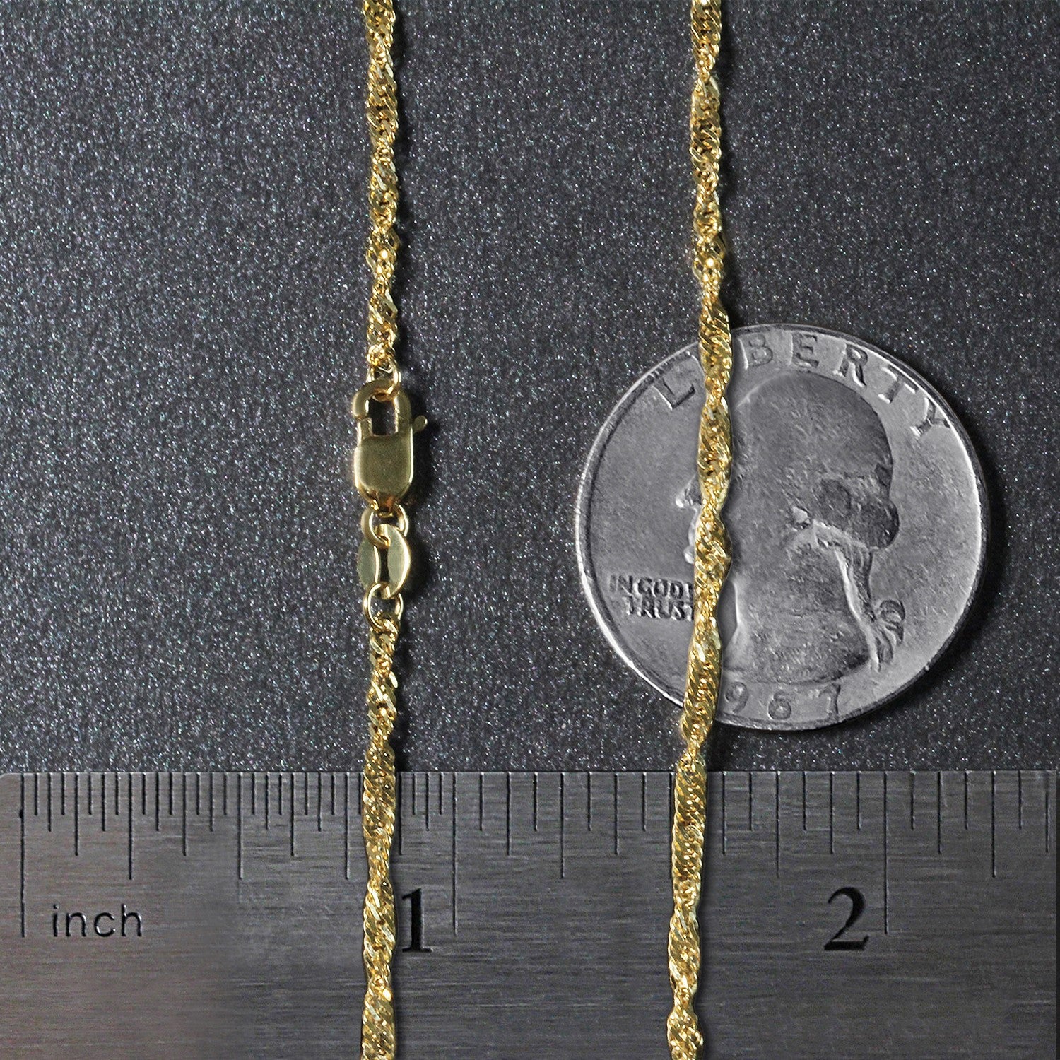 Elegant 14k yellow gold Singapore chain, 1.80 mm, showcasing a refined design perfect for layering or standalone wear.