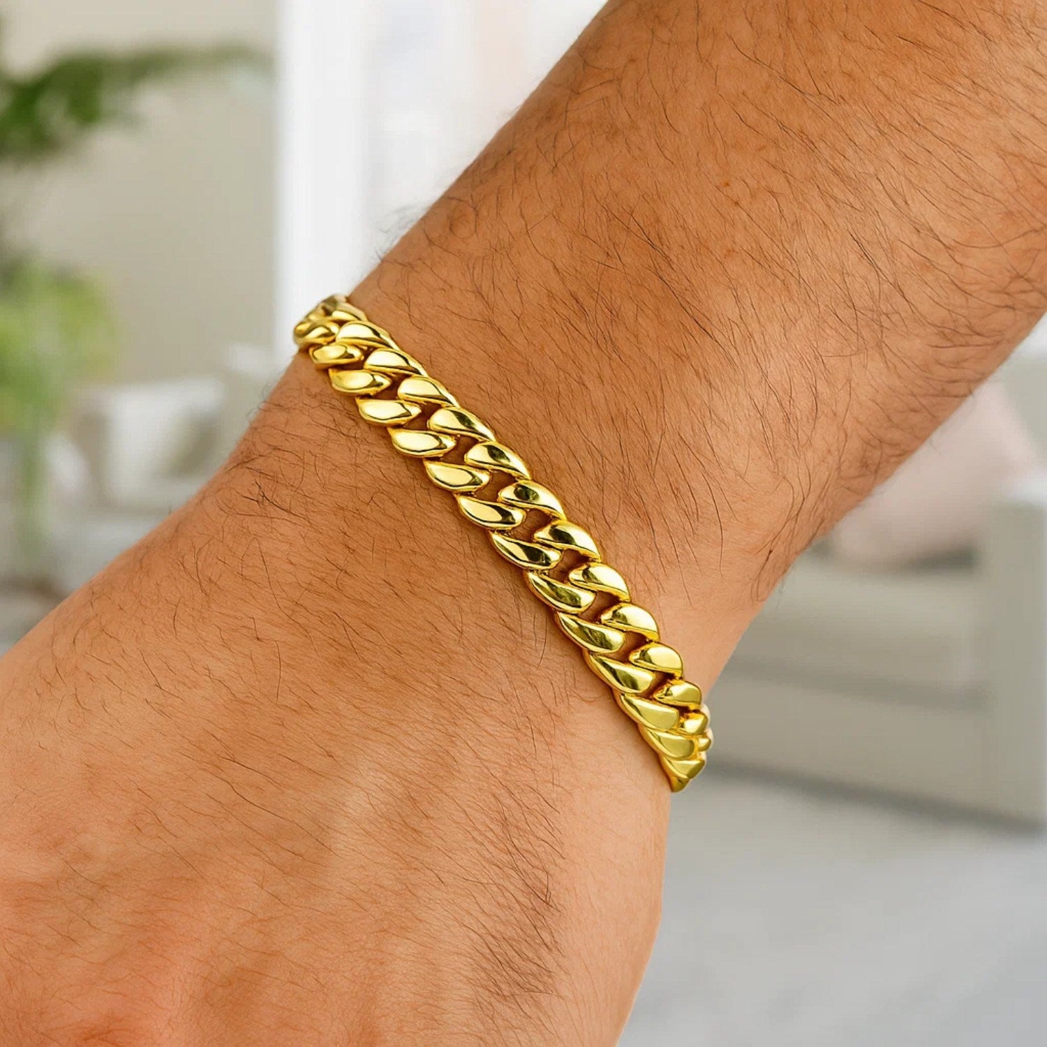 14k yellow gold semi-solid Miami Cuban bracelet with modern link design, showcasing elegance and luxury craftsmanship.