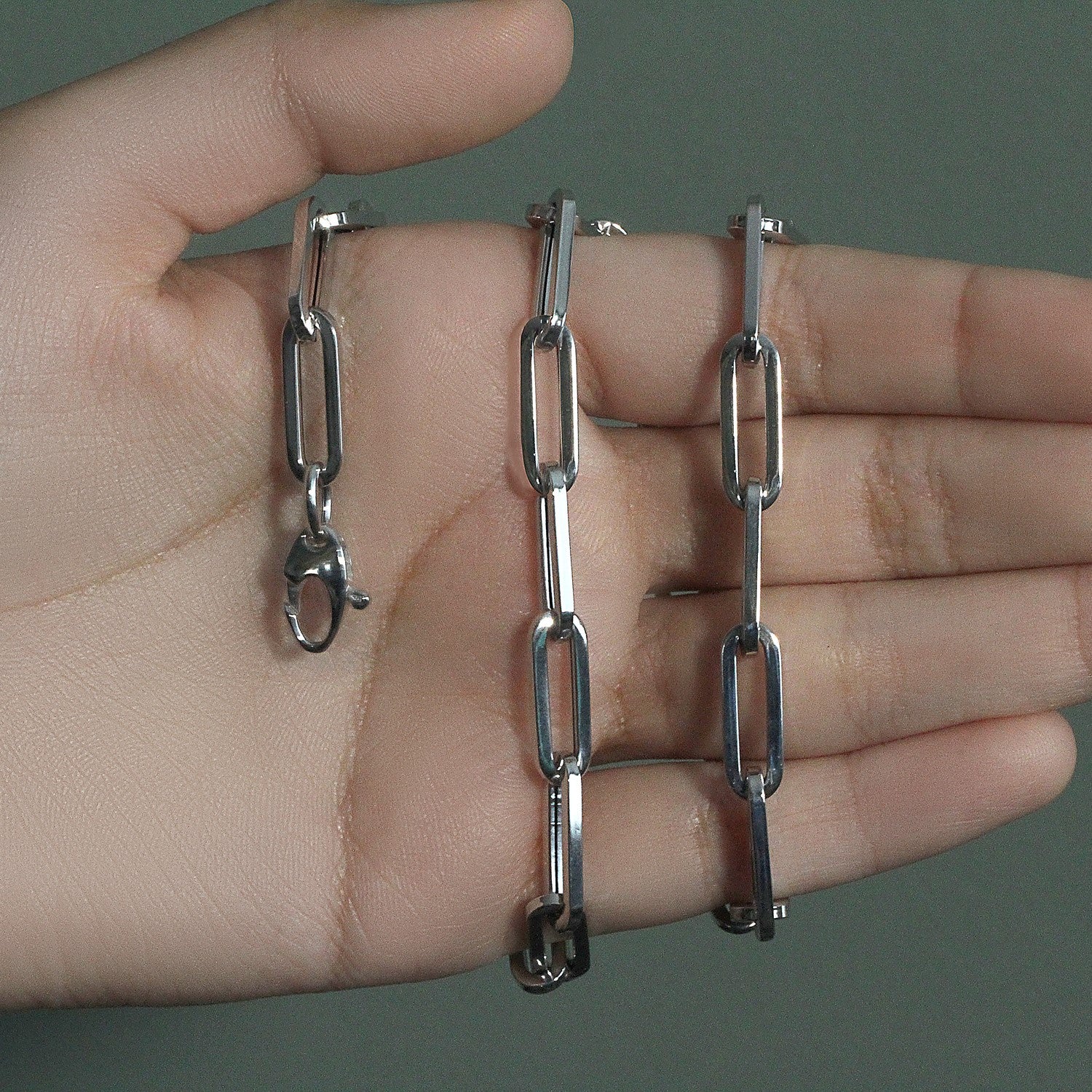 14K white gold wide paperclip chain, modern design with sleek round links, perfect for layering or standalone elegance.