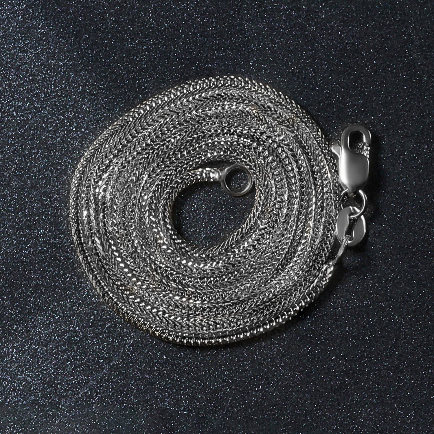 Elegant 14k white gold foxtail chain with a sleek round design, perfect for layering or standalone wear.