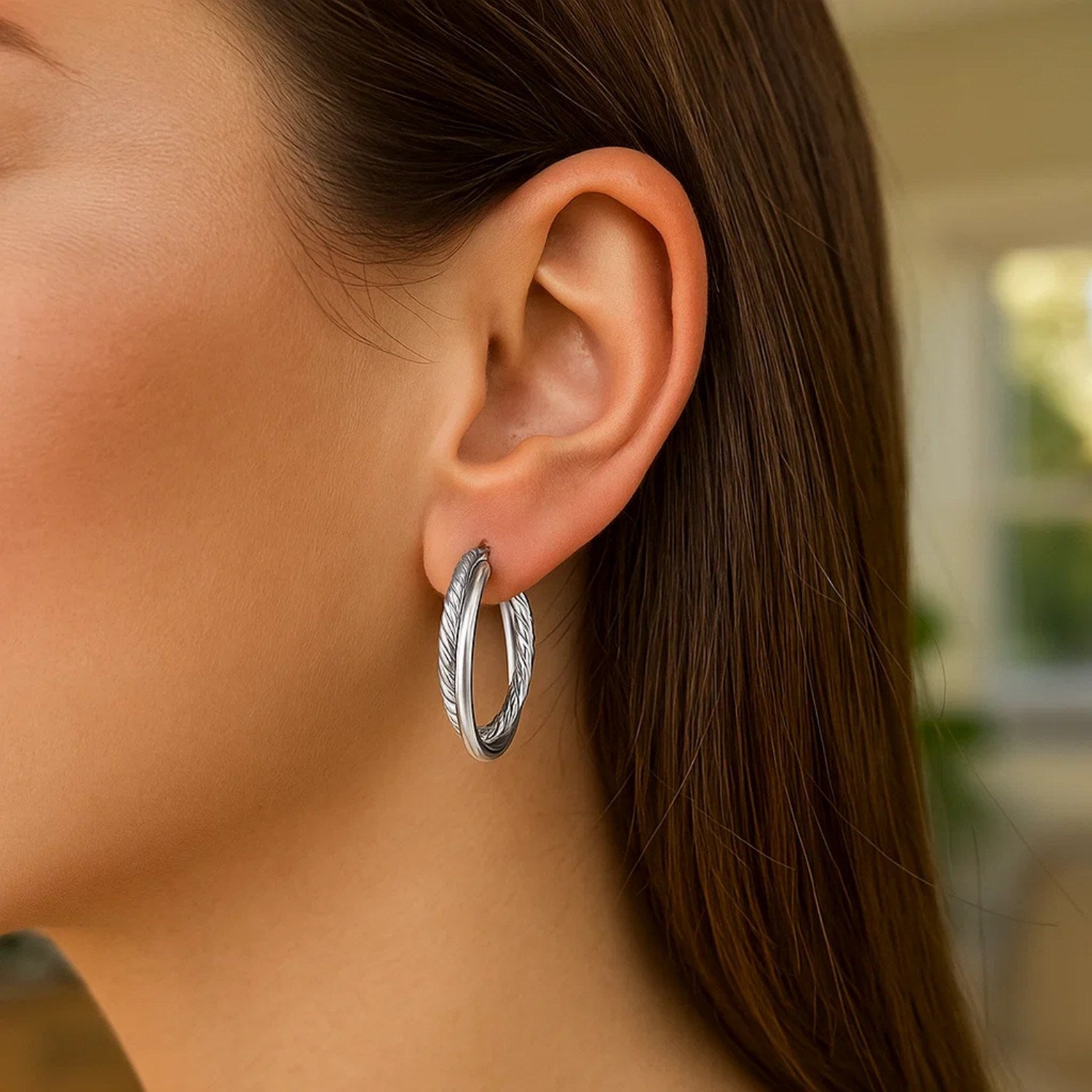 Sterling silver textured ridged hoop earrings exuding elegance and sophistication for the discerning jewelry lover.