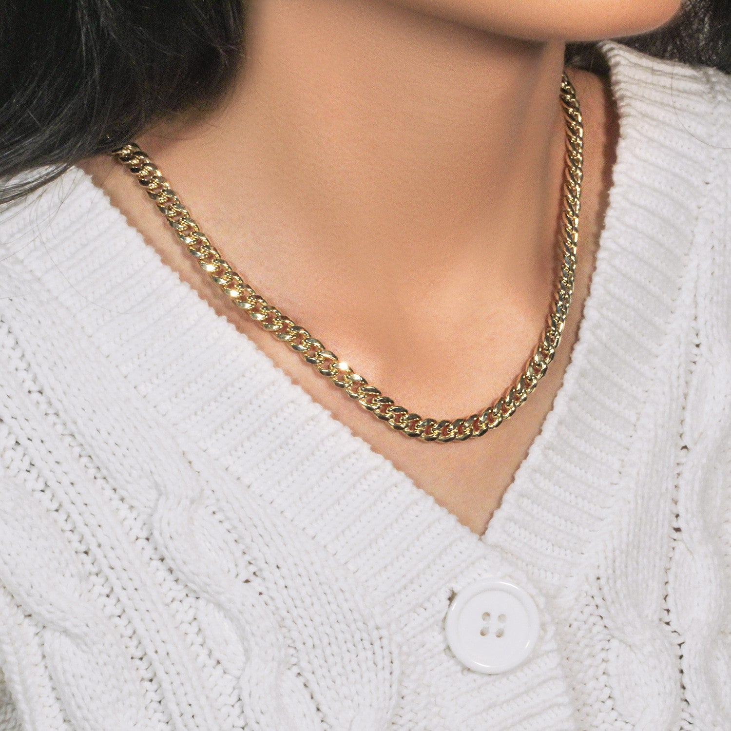 14k yellow gold semi-solid Miami Cuban chain, 6.60 mm, showcasing contemporary link design and luxurious shine.