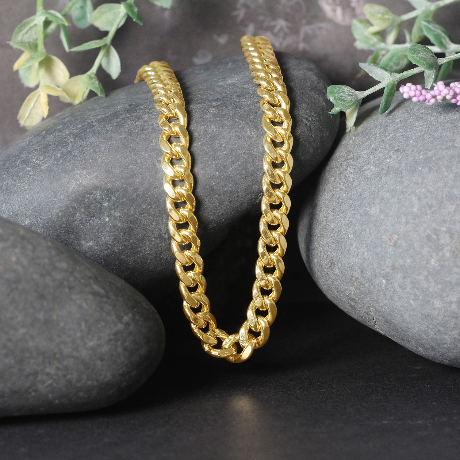 14k yellow gold semi-solid Miami Cuban chain, 6.60 mm, featuring contemporary link design for a luxurious statement.