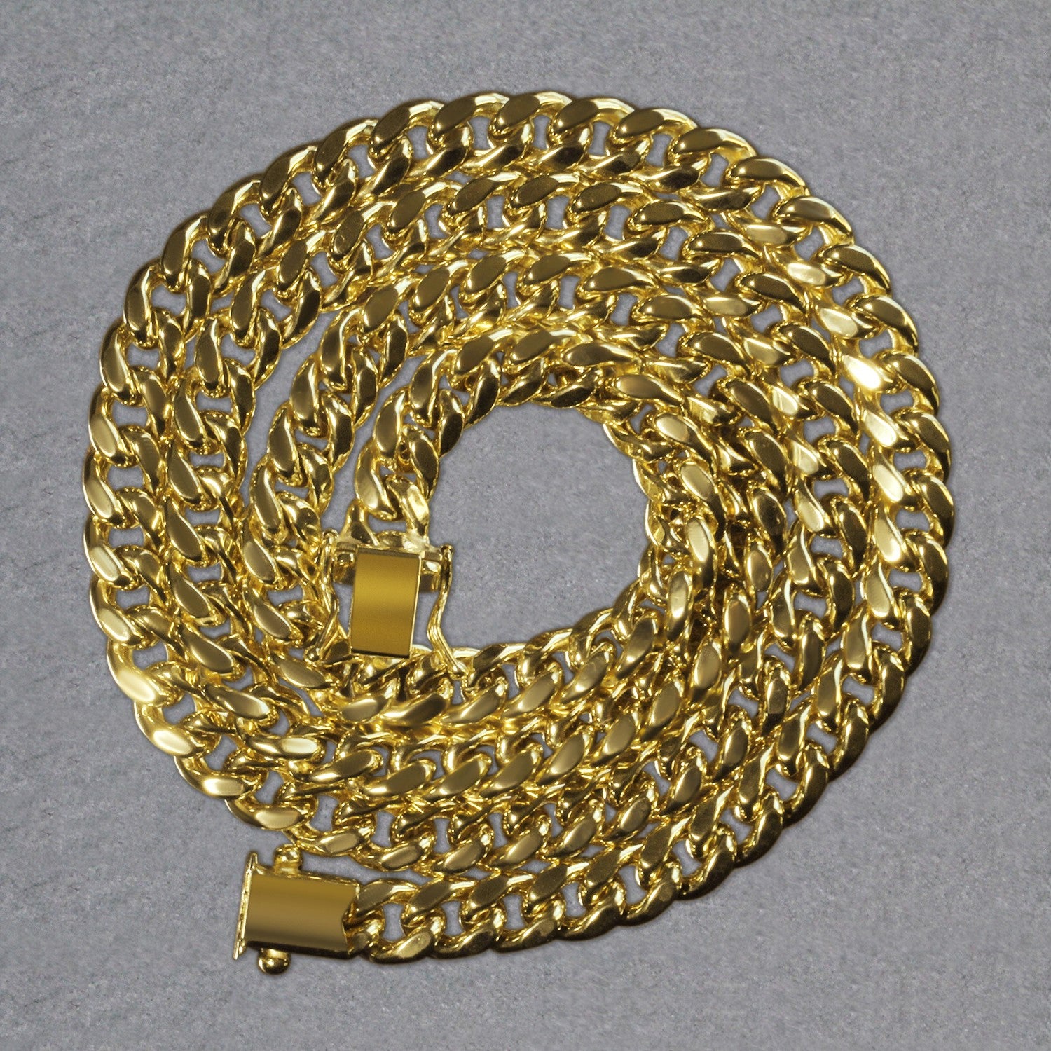 14k yellow gold semi-solid Miami Cuban chain, 6.60 mm, featuring contemporary links for a luxurious statement.