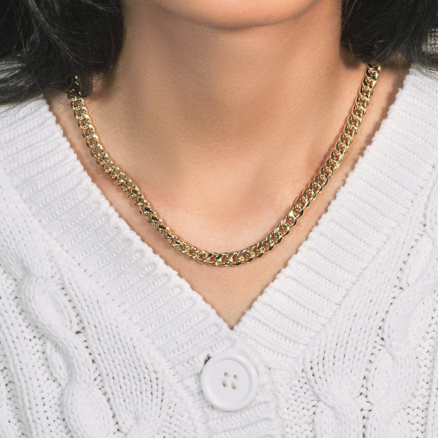 14k yellow gold semi-solid Miami Cuban chain with contemporary link design, showcasing luxury and elegance.