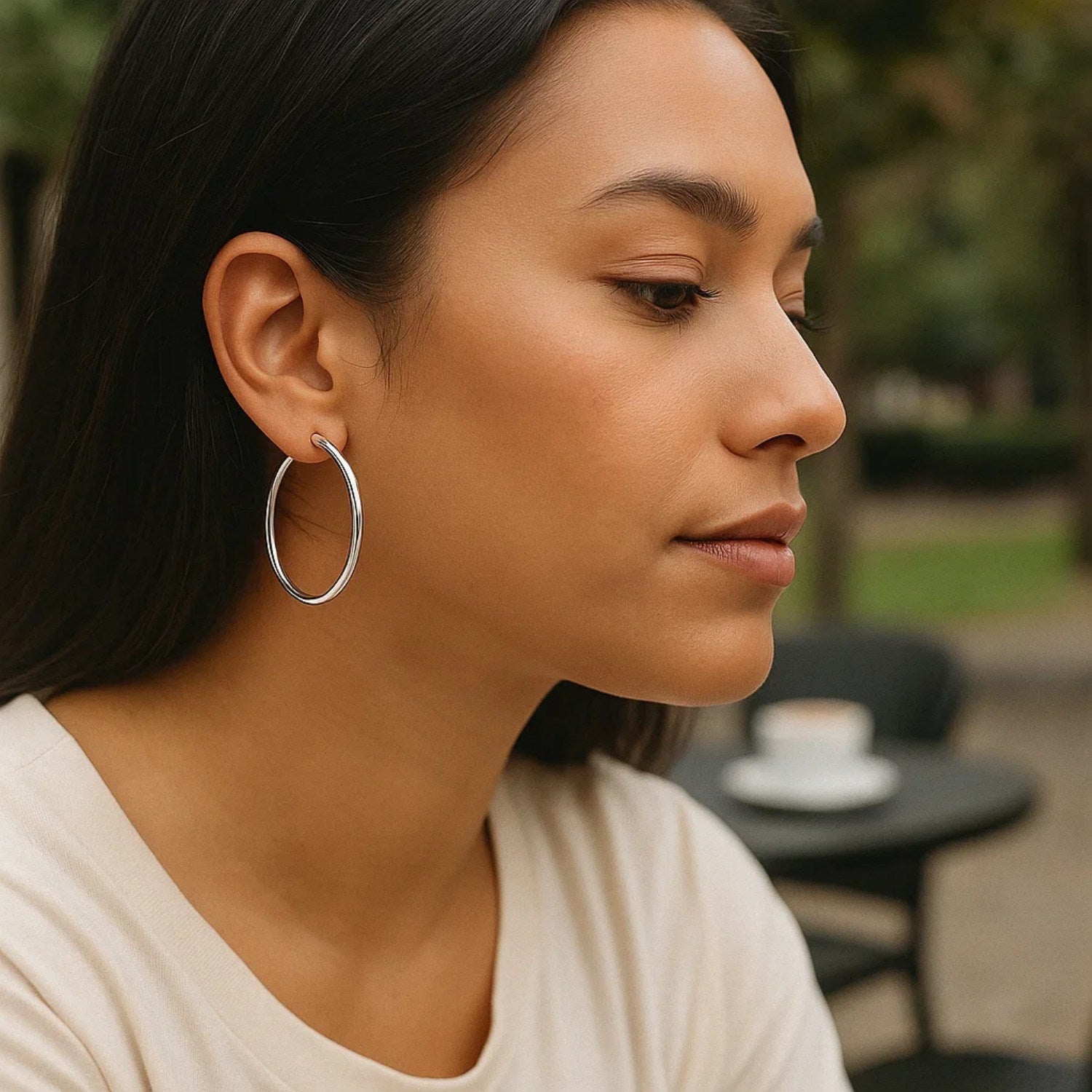 Sterling silver rhodium plated polished classic hoop earrings with a sleek modern design for elegant sophistication.