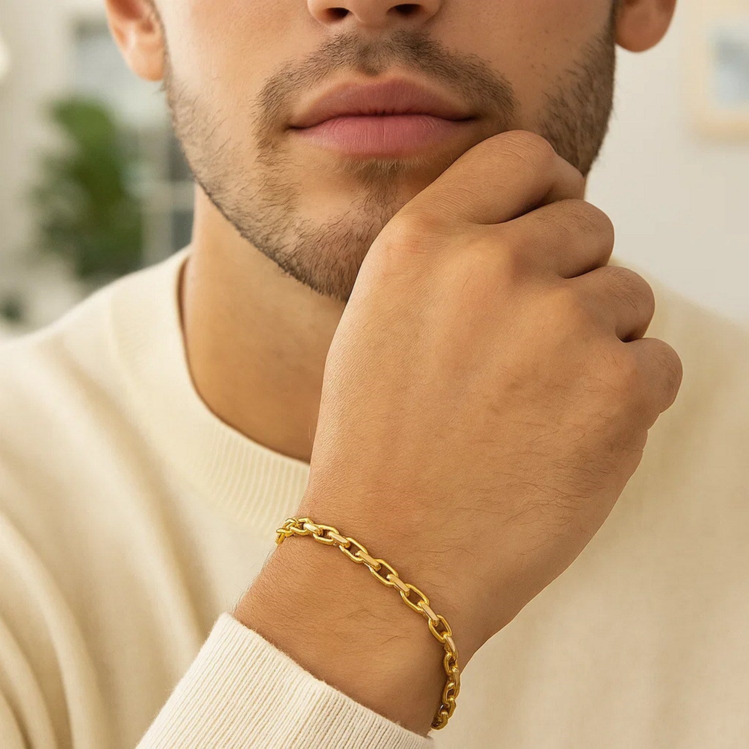14k yellow gold French cable chain bracelet featuring a modern design with elegant round links, perfect for luxury styling.