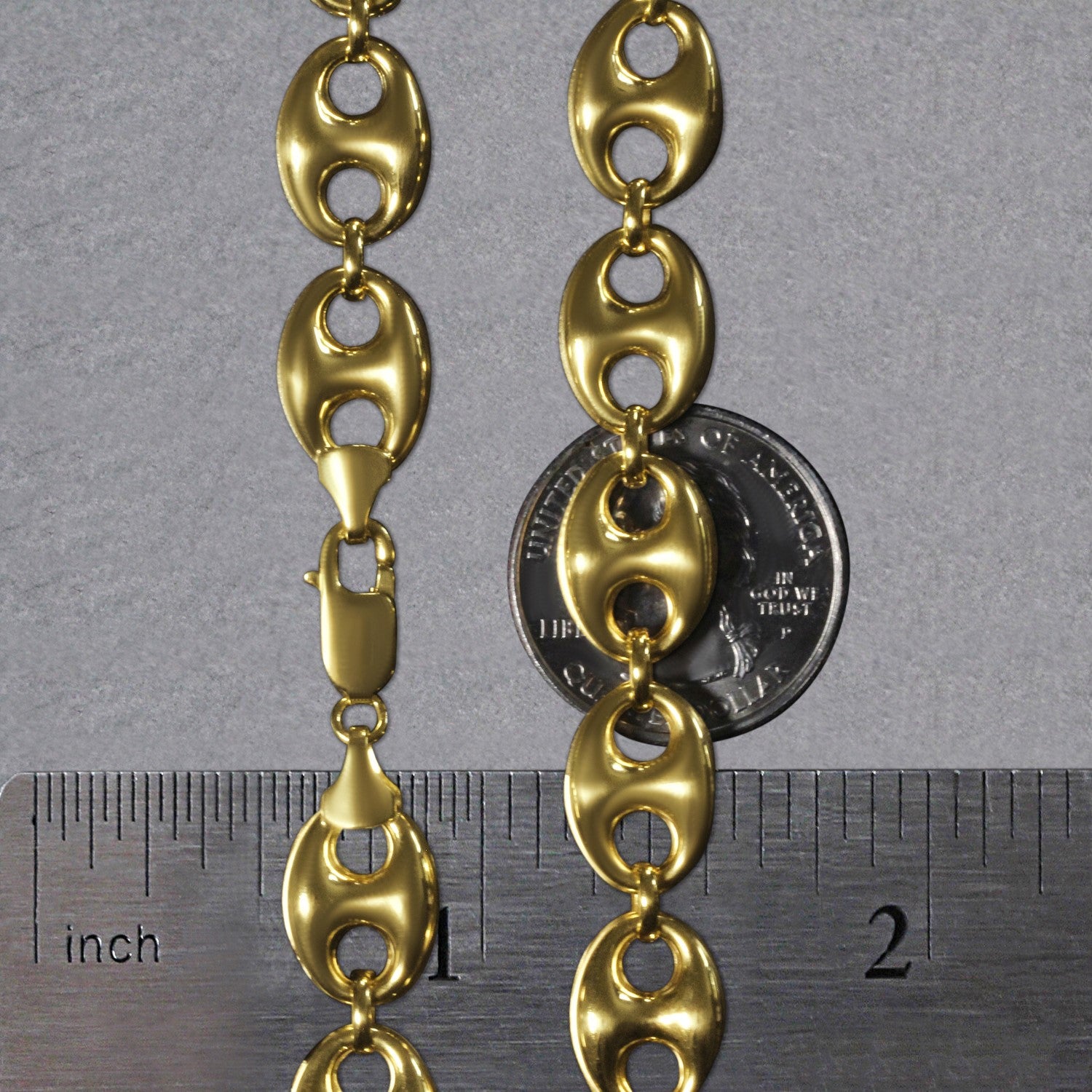 14k yellow gold puffed mariner link chain with a classic design, featuring elegant round links for timeless sophistication.
