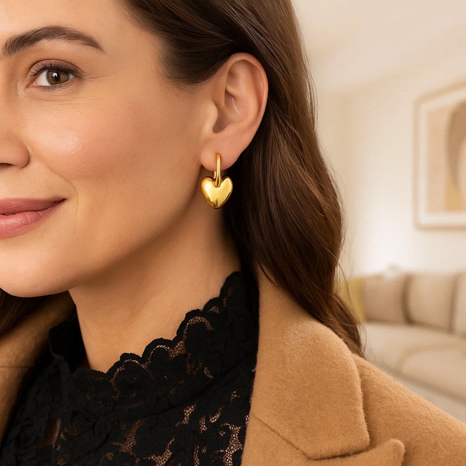 14K yellow gold puffy heart dangle huggie earrings with modern hoop design, perfect for elegant occasions.