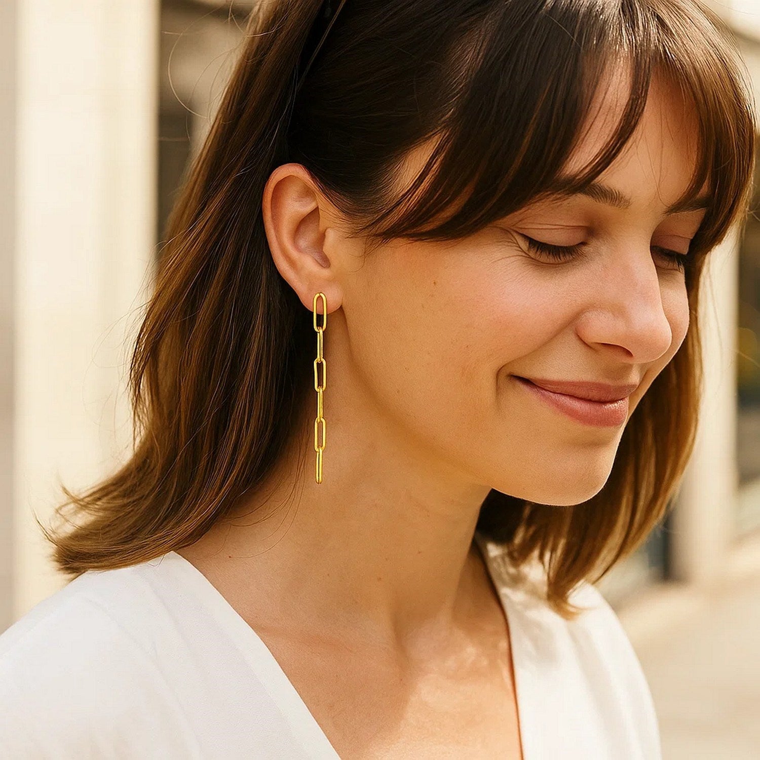 14k yellow gold chain link dangle earrings showcasing modern elegance and refined craftsmanship.