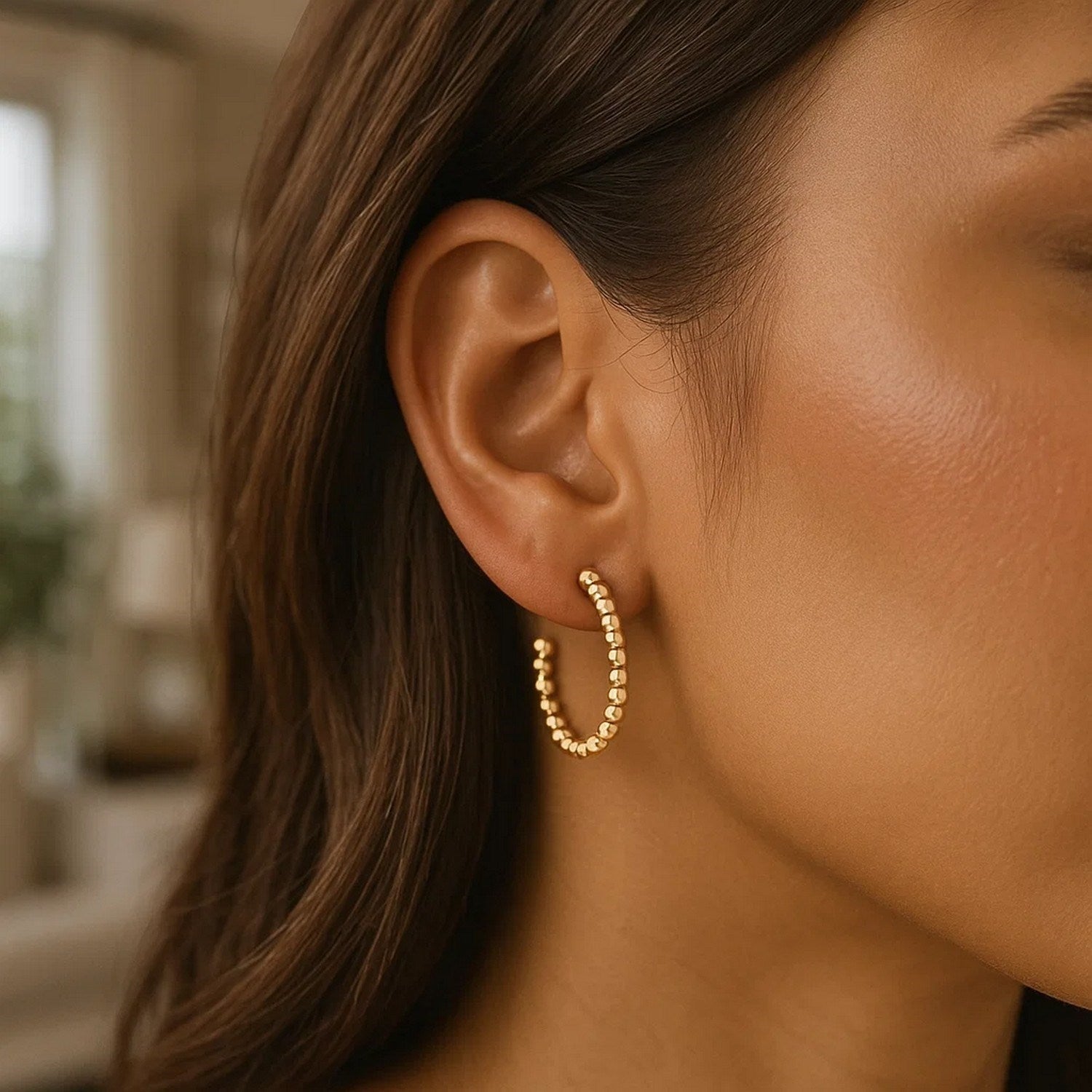 14K yellow gold modern beaded hoop earrings showcasing exquisite craftsmanship and timeless elegance.