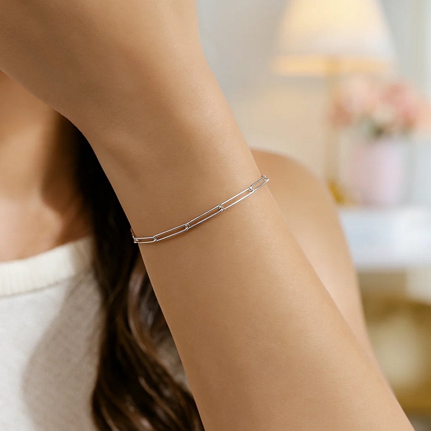 14k white gold wire paperclip bracelet with a modern design, showcasing luxury and elegance in every detail.