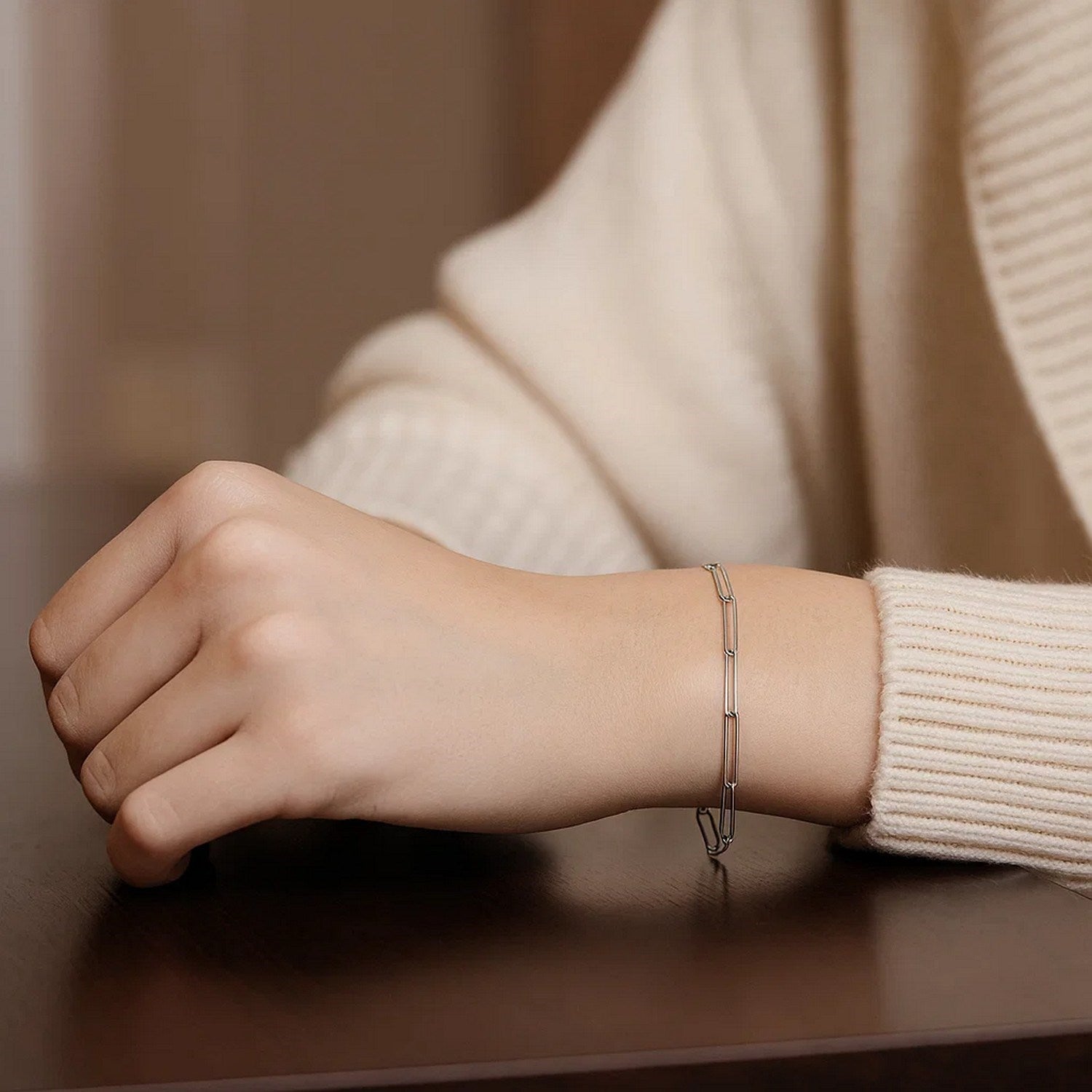 14k white gold wire paperclip bracelet with modern design, featuring sleek links for a luxurious touch.