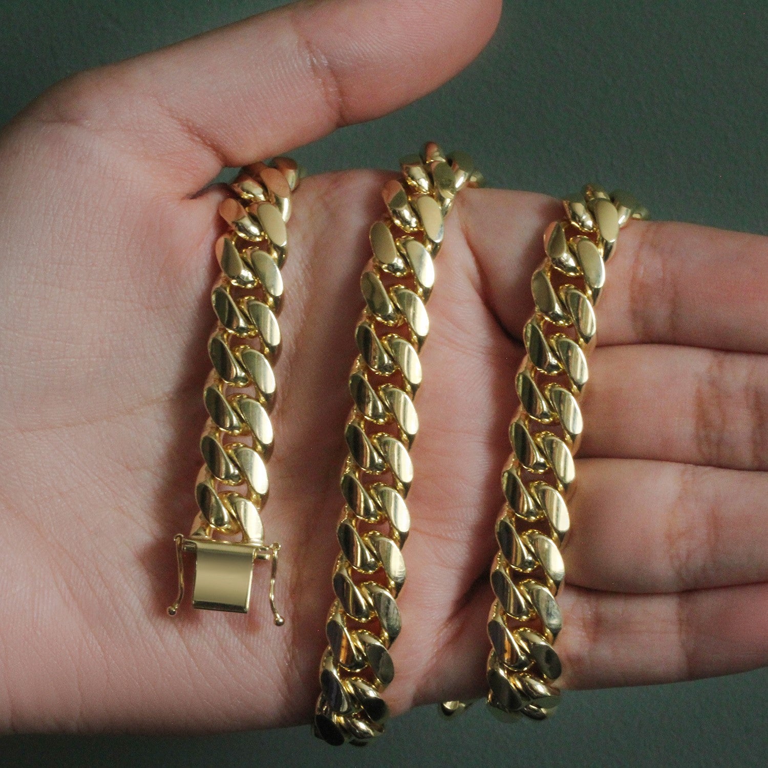 14k yellow gold classic Miami Cuban chain, 10.10 mm, showcasing timeless elegance and luxurious craftsmanship.