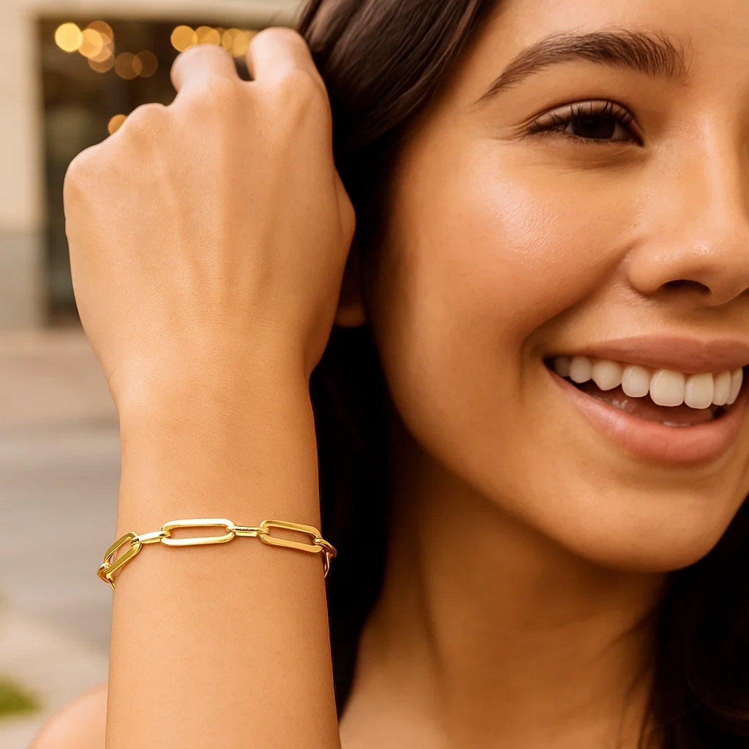 14k yellow gold Bombay paperclip chain bracelet, modern design with elegant links, 7 1/4 inch length.