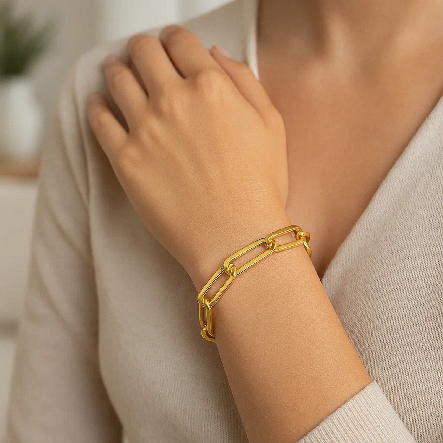 14k yellow gold extra wide paperclip chain bracelet, modern design with elegant round links, 8 inches long.