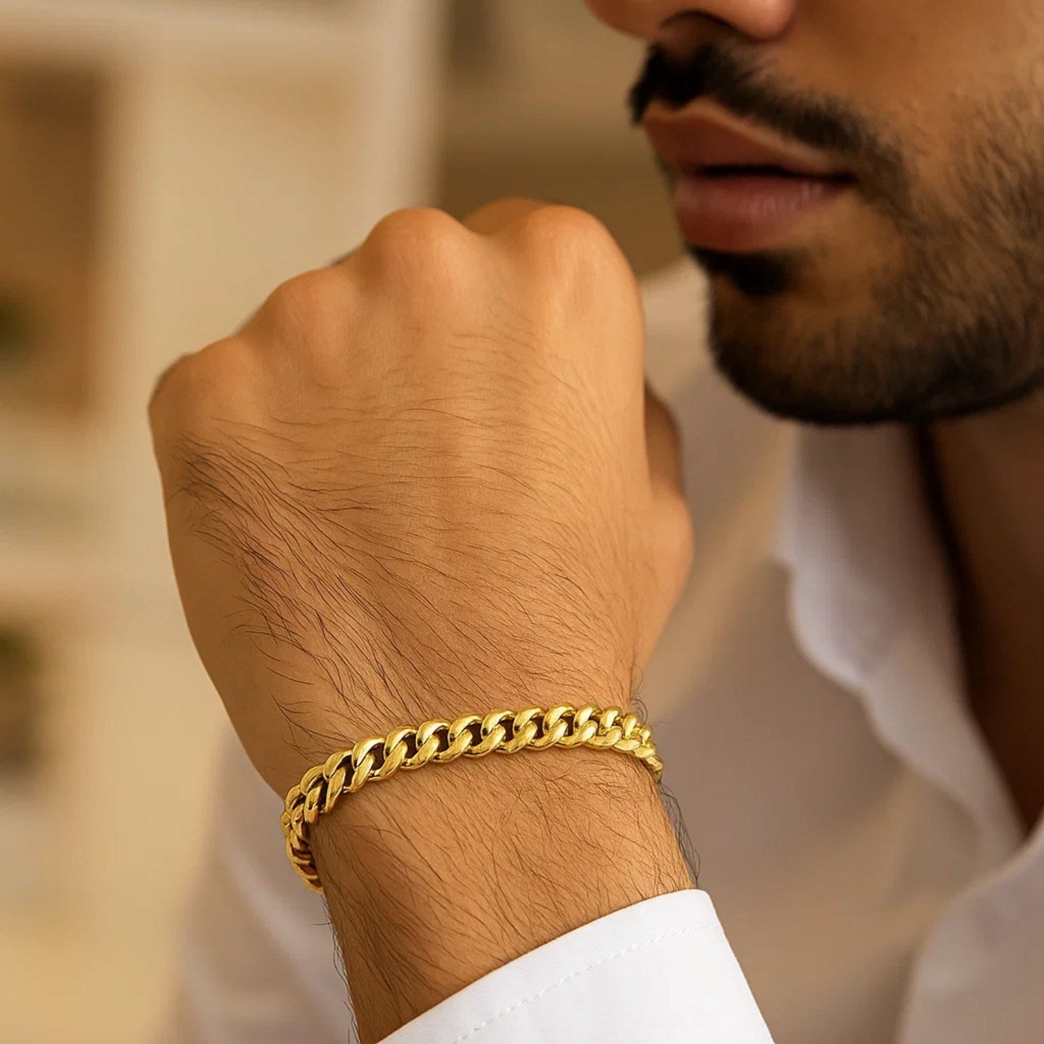 14k yellow gold classic Miami Cuban bracelet with solid links, showcasing modern elegance and timeless luxury.