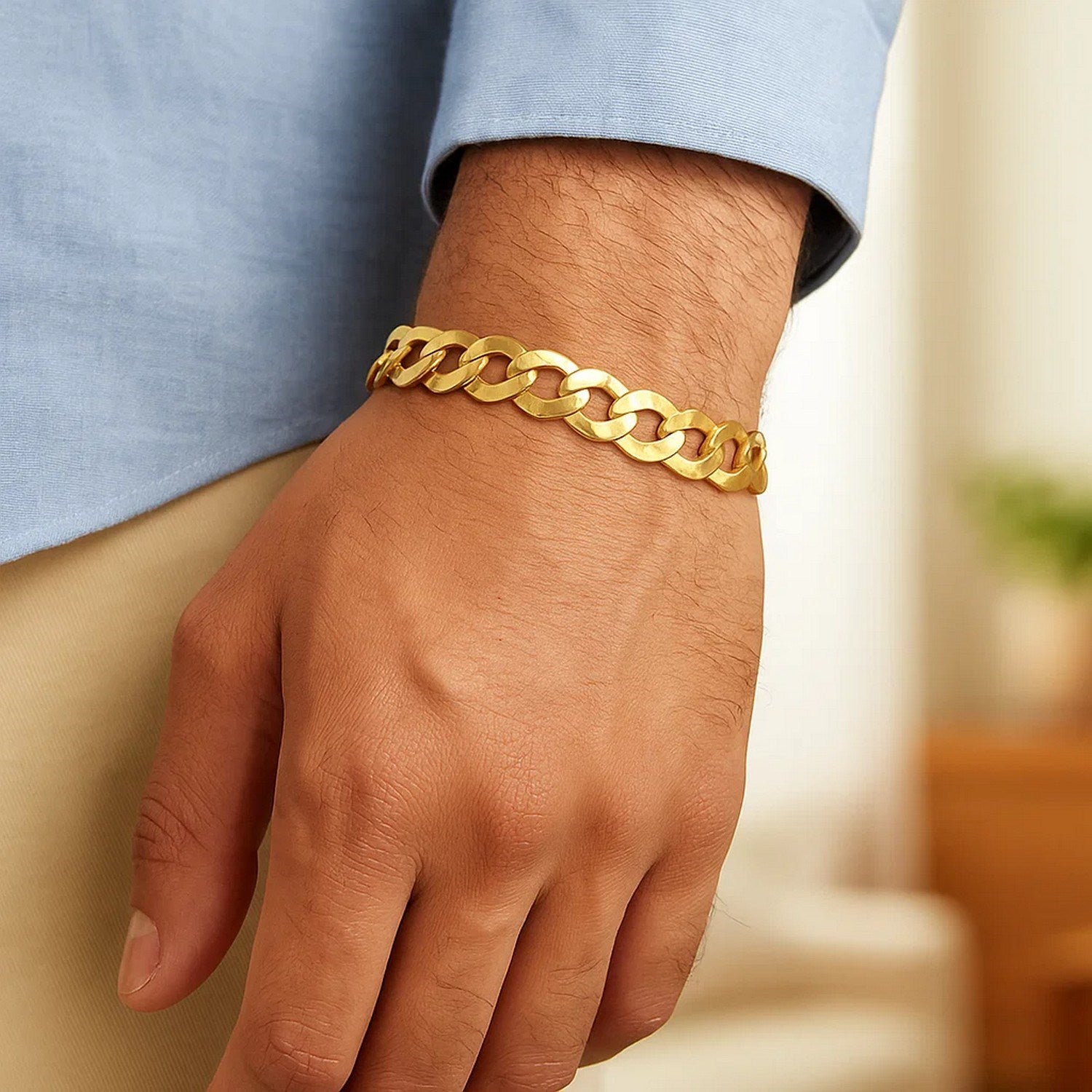 14k yellow gold solid curb bracelet featuring modern chain links, showcasing luxury craftsmanship and timeless elegance.