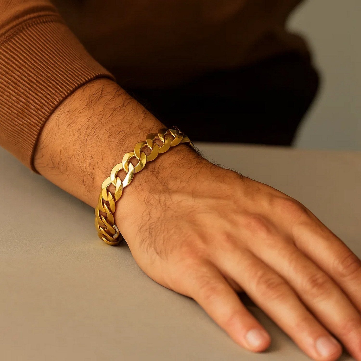 14k yellow gold solid curb bracelet featuring a modern link design, elegantly crafted for timeless luxury.