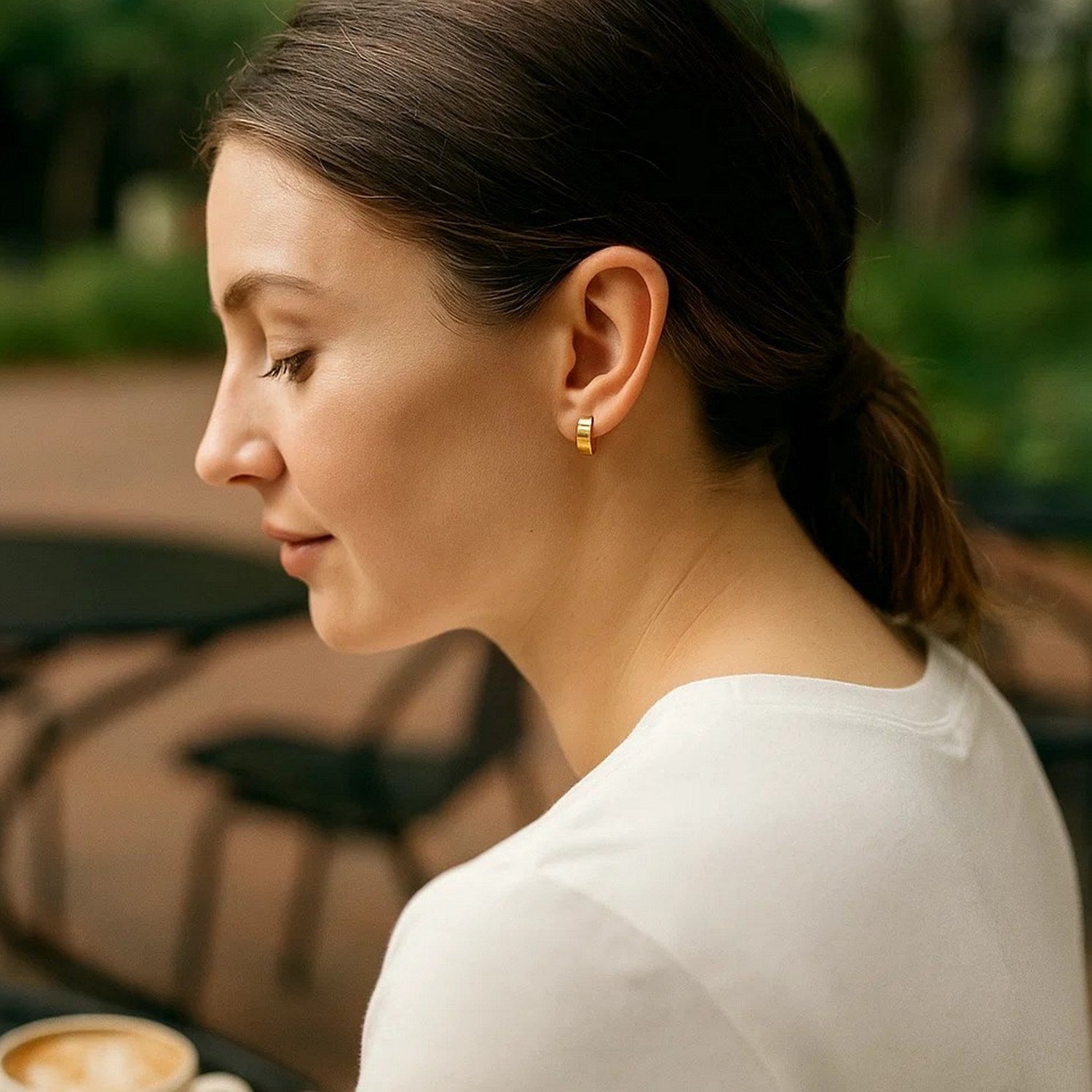 14k yellow gold contemporary hoop earrings with a sleek, snuggable design for effortless elegance.