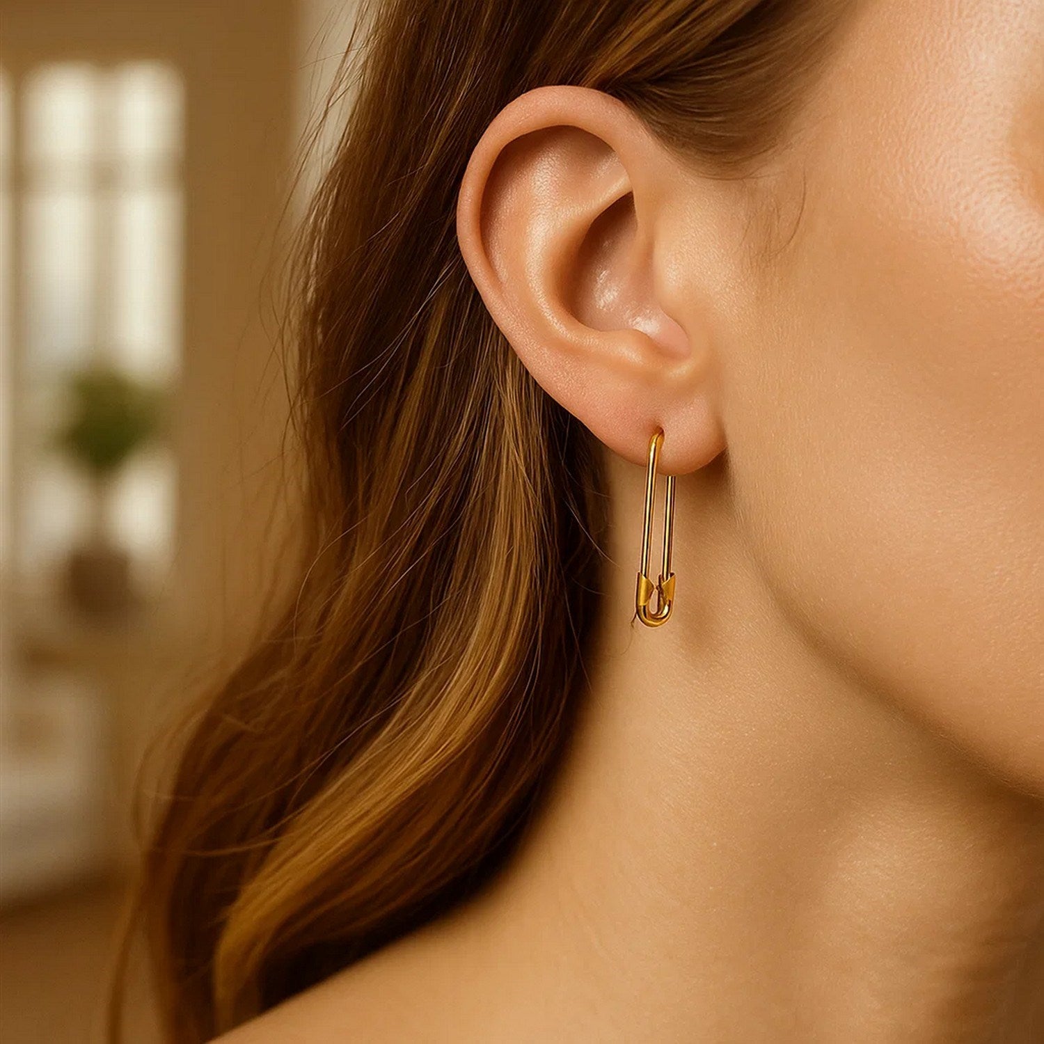 14k yellow gold textured dangle earrings with modern design, perfect for elegant occasions and statement styling.