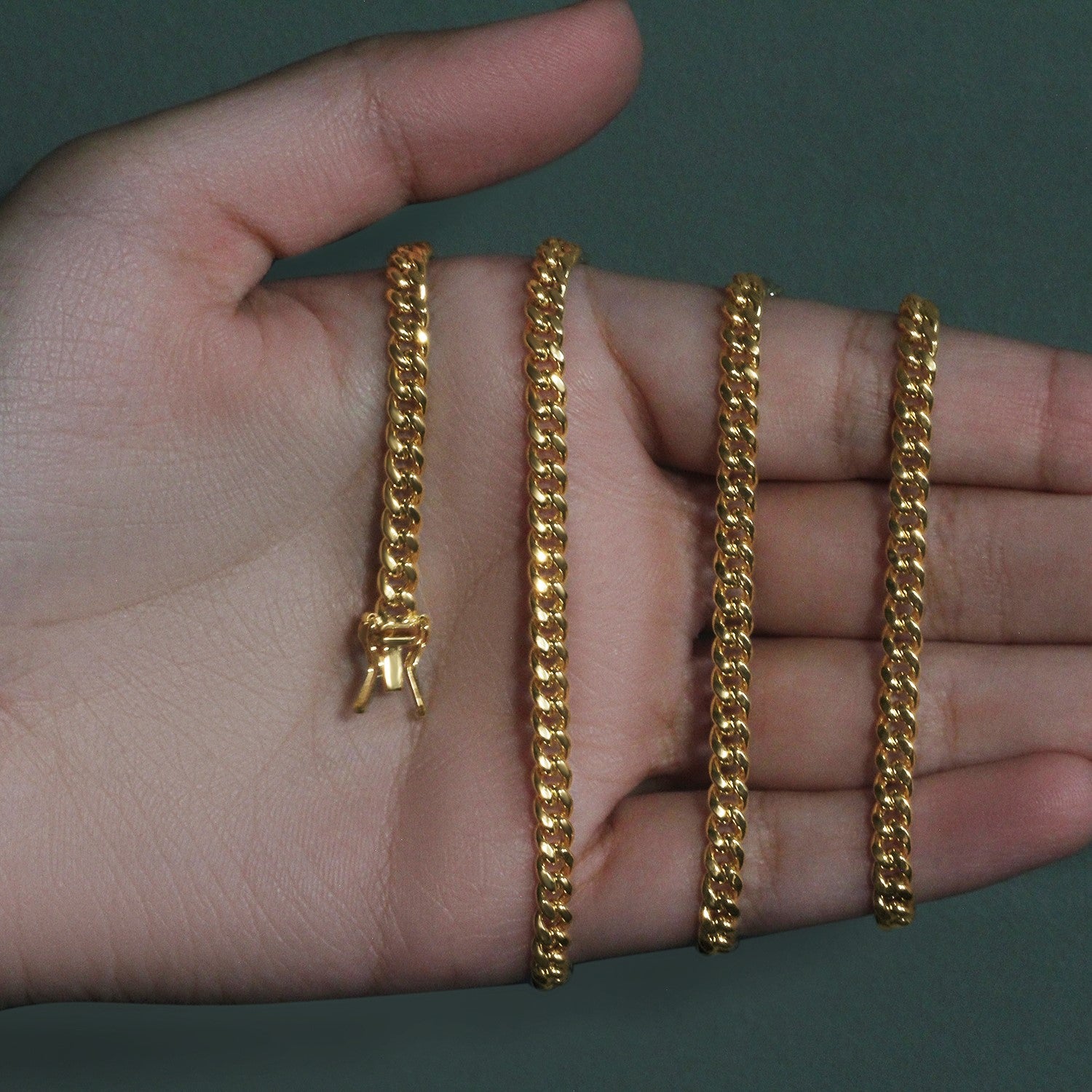 14k yellow gold semi-solid Miami Cuban chain, 4.50 mm, featuring a classic round design for timeless elegance.