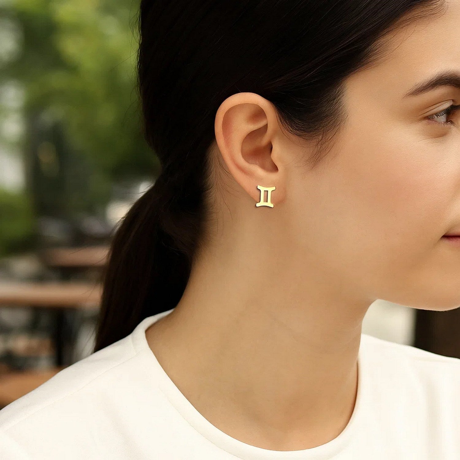 14k yellow gold modern stud earrings featuring a sleek design, perfect for elegant everyday wear.