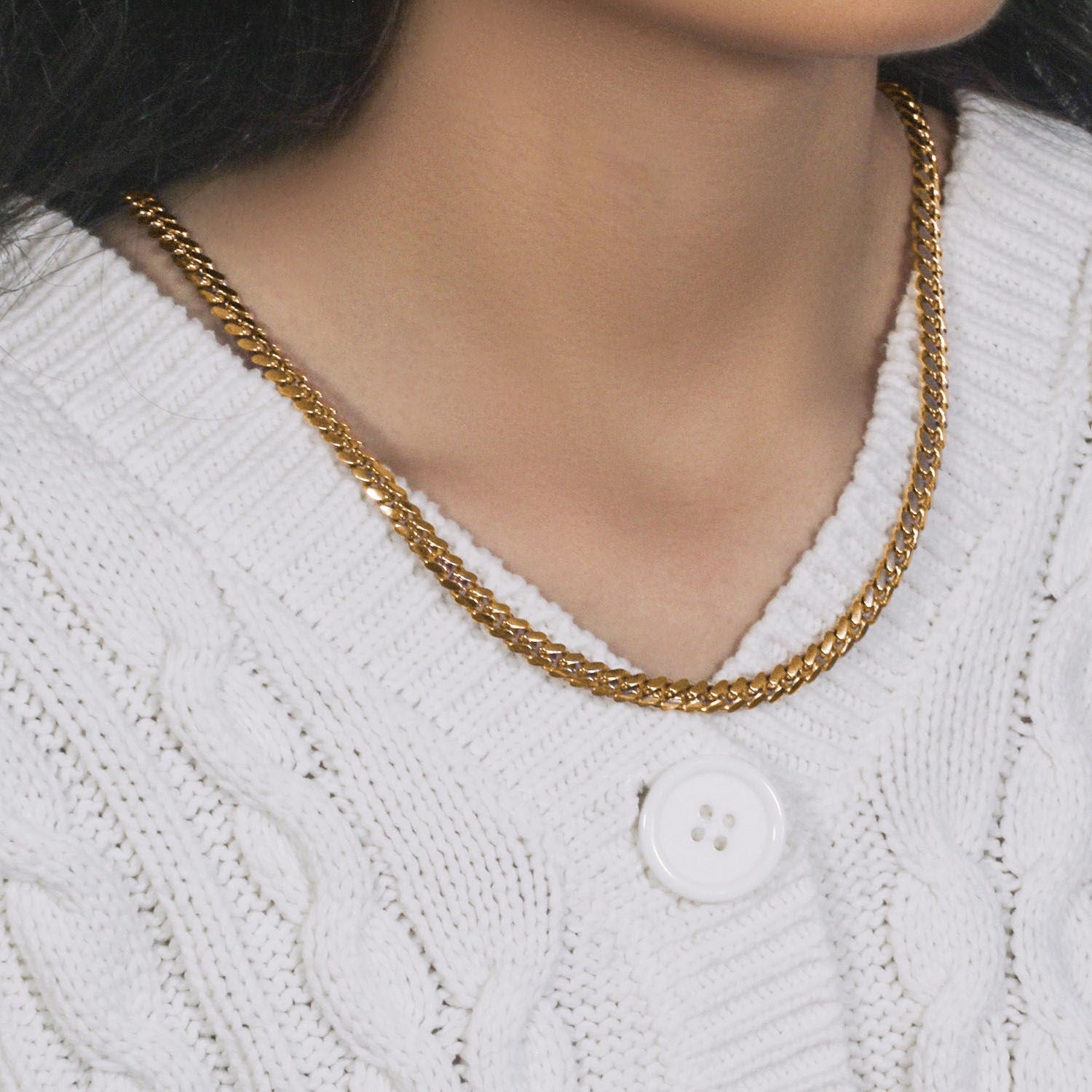 14k yellow gold classic Miami Cuban chain, 6.10 mm, featuring a timeless round design for elegant layering.