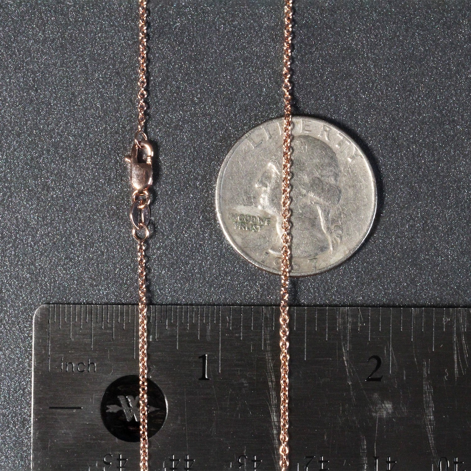 14k rose gold round cable link chain, elegant design with a luxurious shine, perfect for layering or standalone wear.