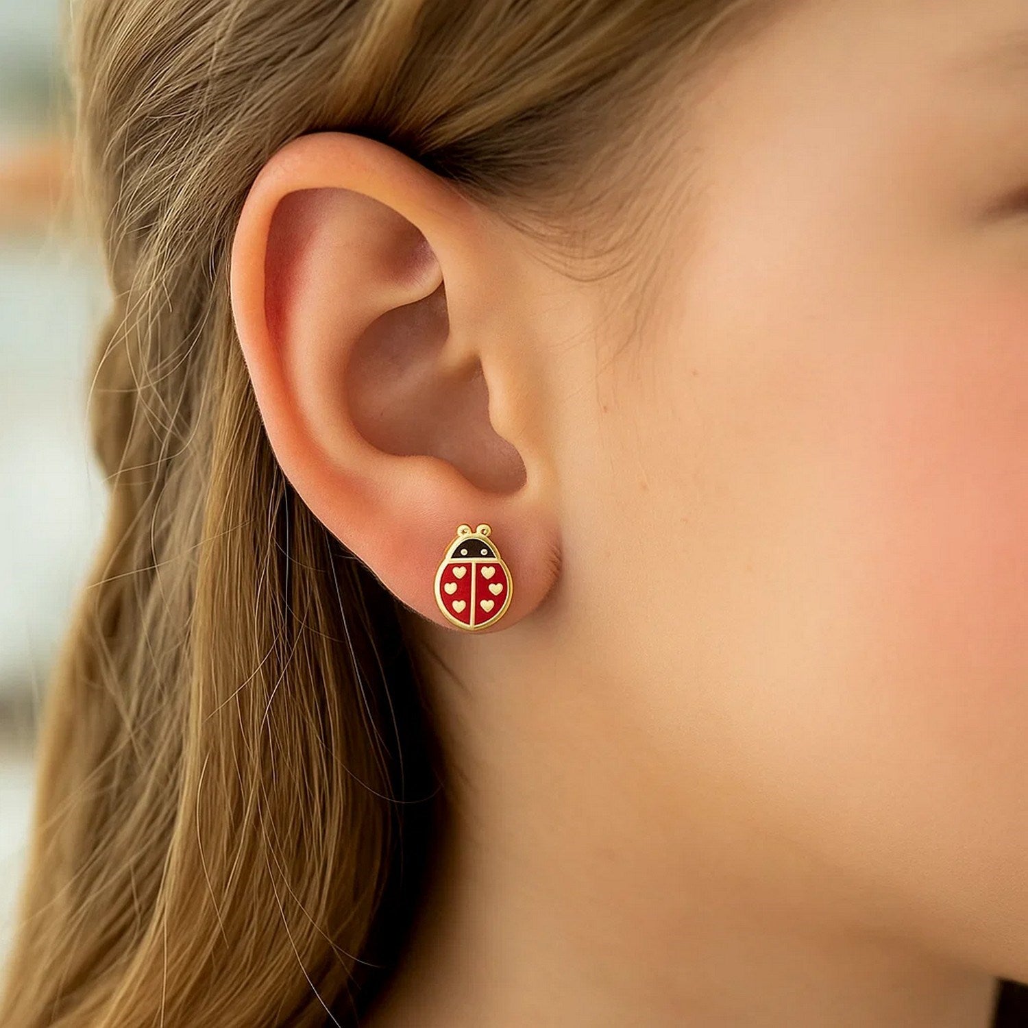 14k yellow gold dangle earrings featuring elegant ladybug enamel design, perfect for a luxurious statement look.