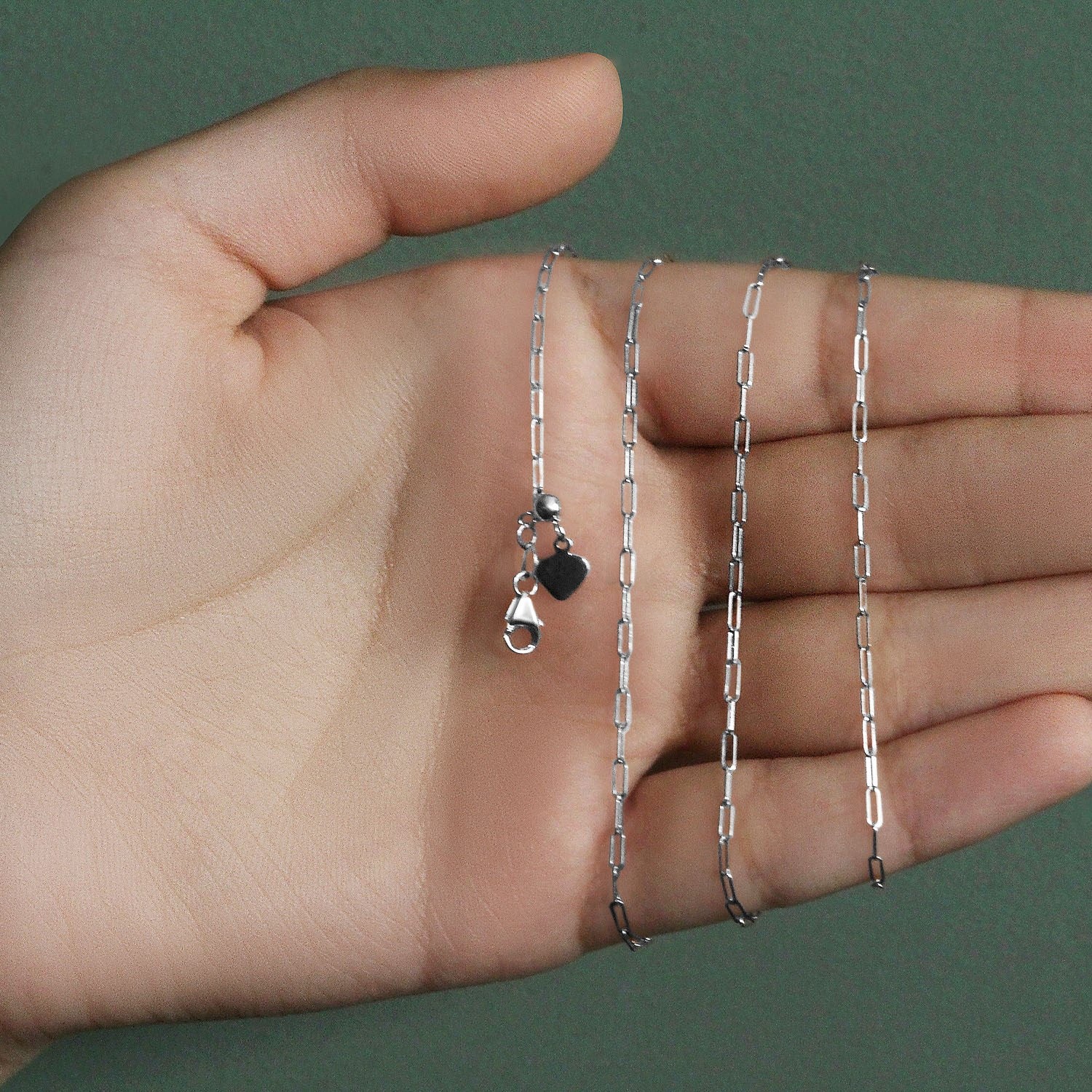 14k white gold adjustable paperclip chain featuring modern links, perfect for layering or standalone elegance.