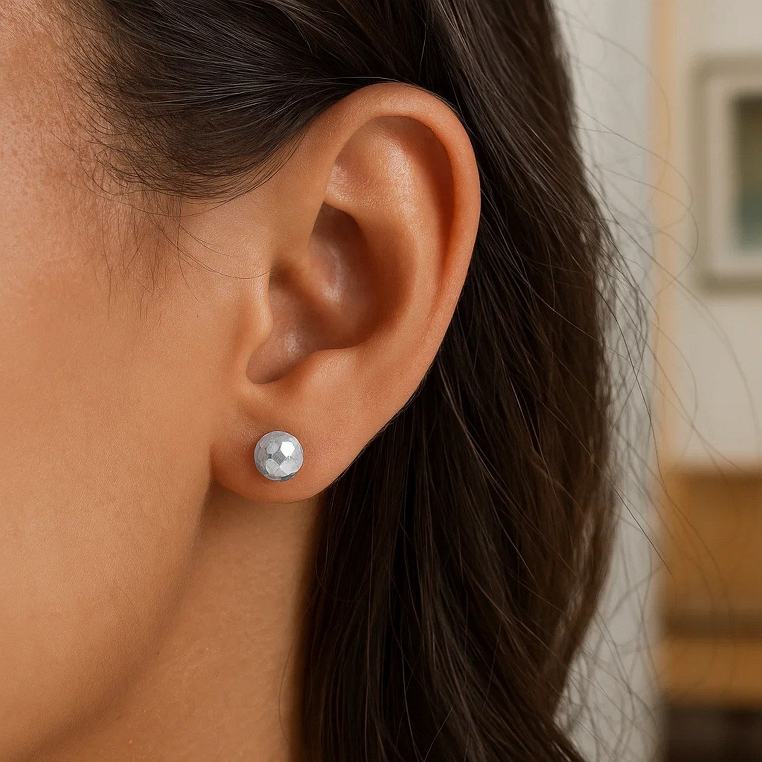 14k white gold faceted ball stud earrings showcasing modern elegance and timeless sophistication.