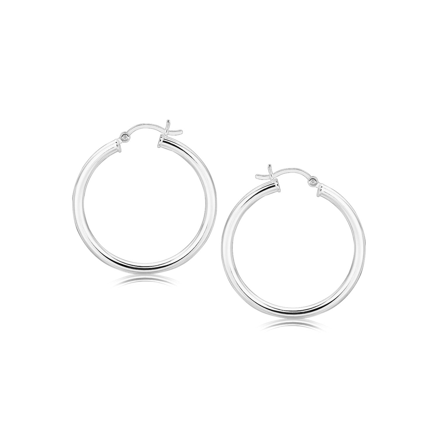 Sterling silver polished hoop earrings with rhodium plating, showcasing a sleek modern design for elegant wear.