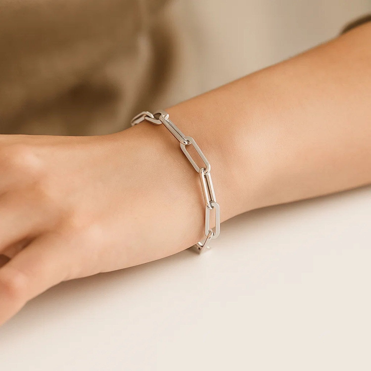 14k white gold extra wide paperclip chain bracelet, contemporary design with sleek, elegant links for a luxurious look.