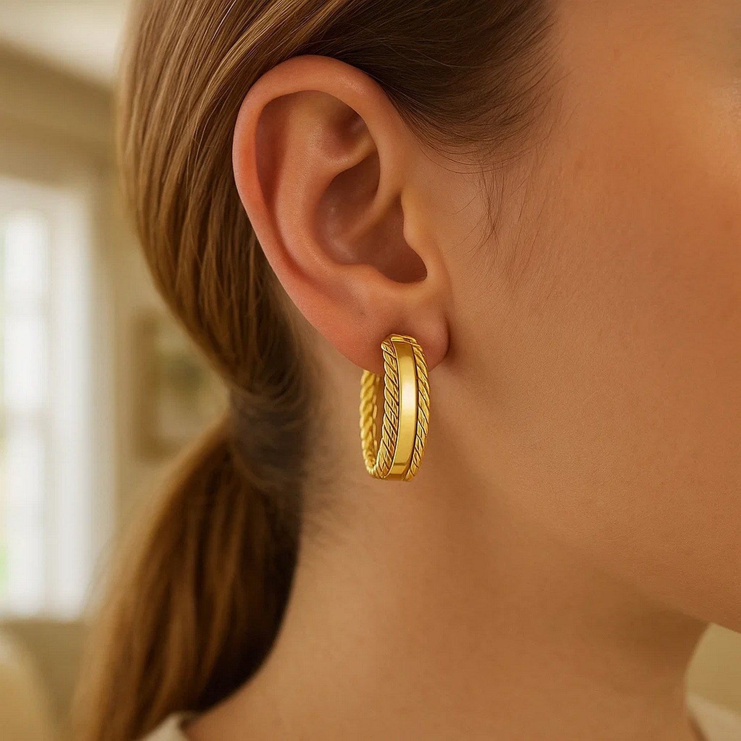 14K yellow gold modern triple row hoop earrings showcasing a sleek, elegant design for a luxurious touch.