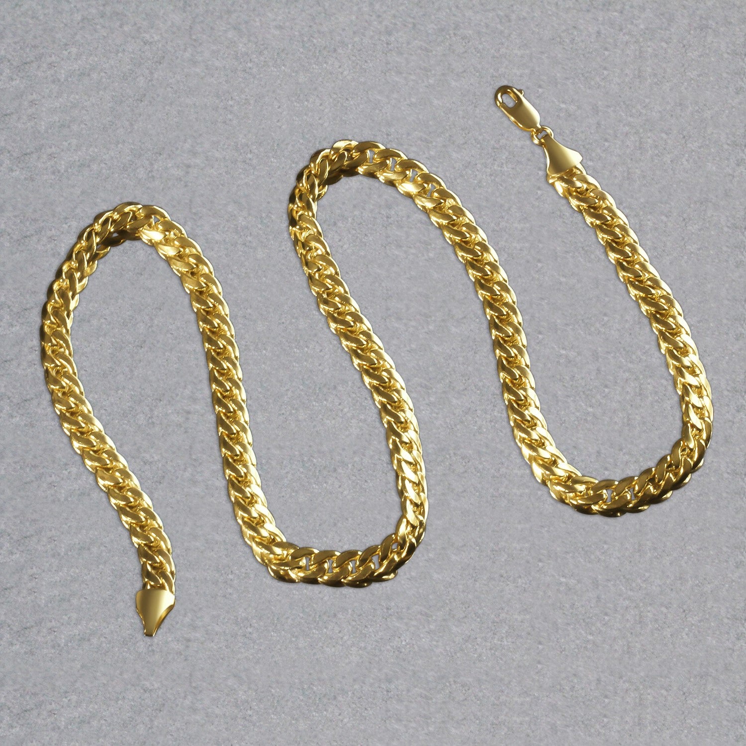 14k yellow gold Miami Cuban semi-solid chain, modern design, 7.00 mm width, perfect for layering or standalone elegance.
