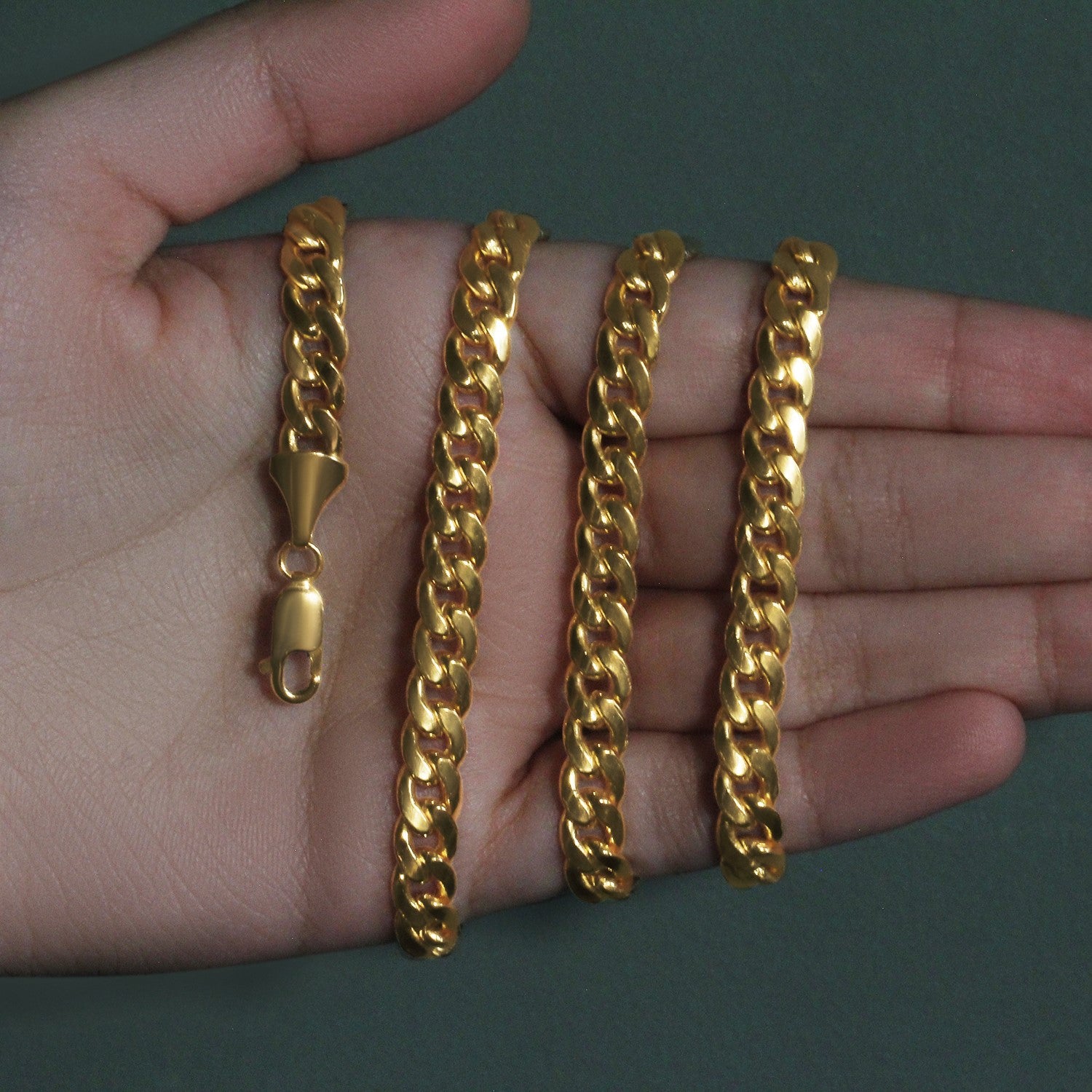 14k yellow gold Miami Cuban semi-solid chain, modern design with 7.00 mm round links, perfect for luxury layering.