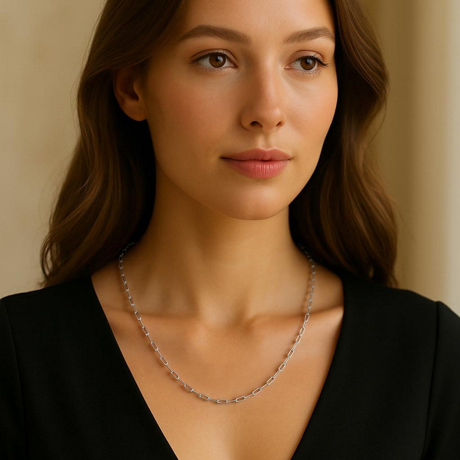 14k white gold fine paperclip chain with modern design, featuring sleek round links for an elegant look.