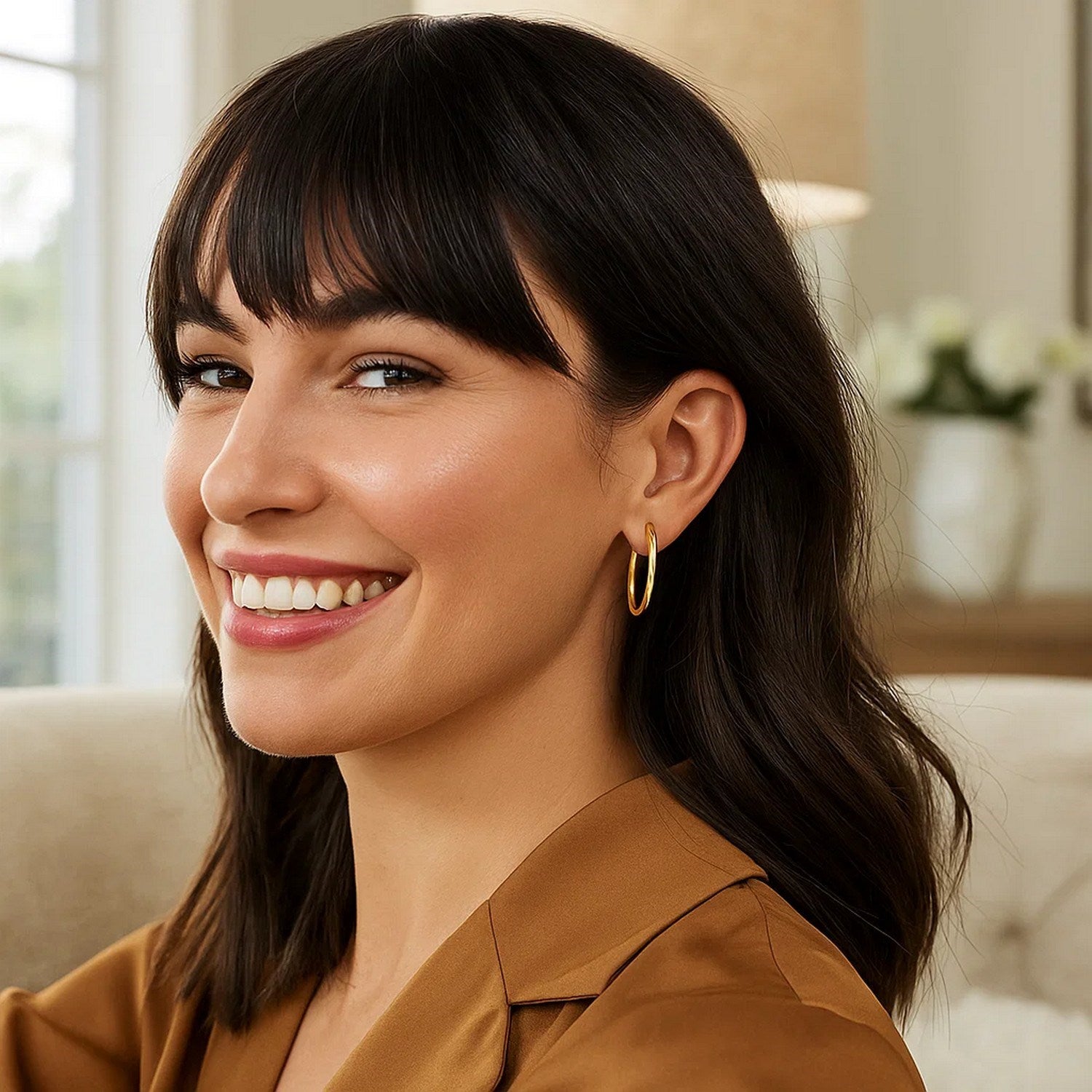 14k yellow gold modern endless oval hoop earrings showcasing elegant craftsmanship and timeless design.
