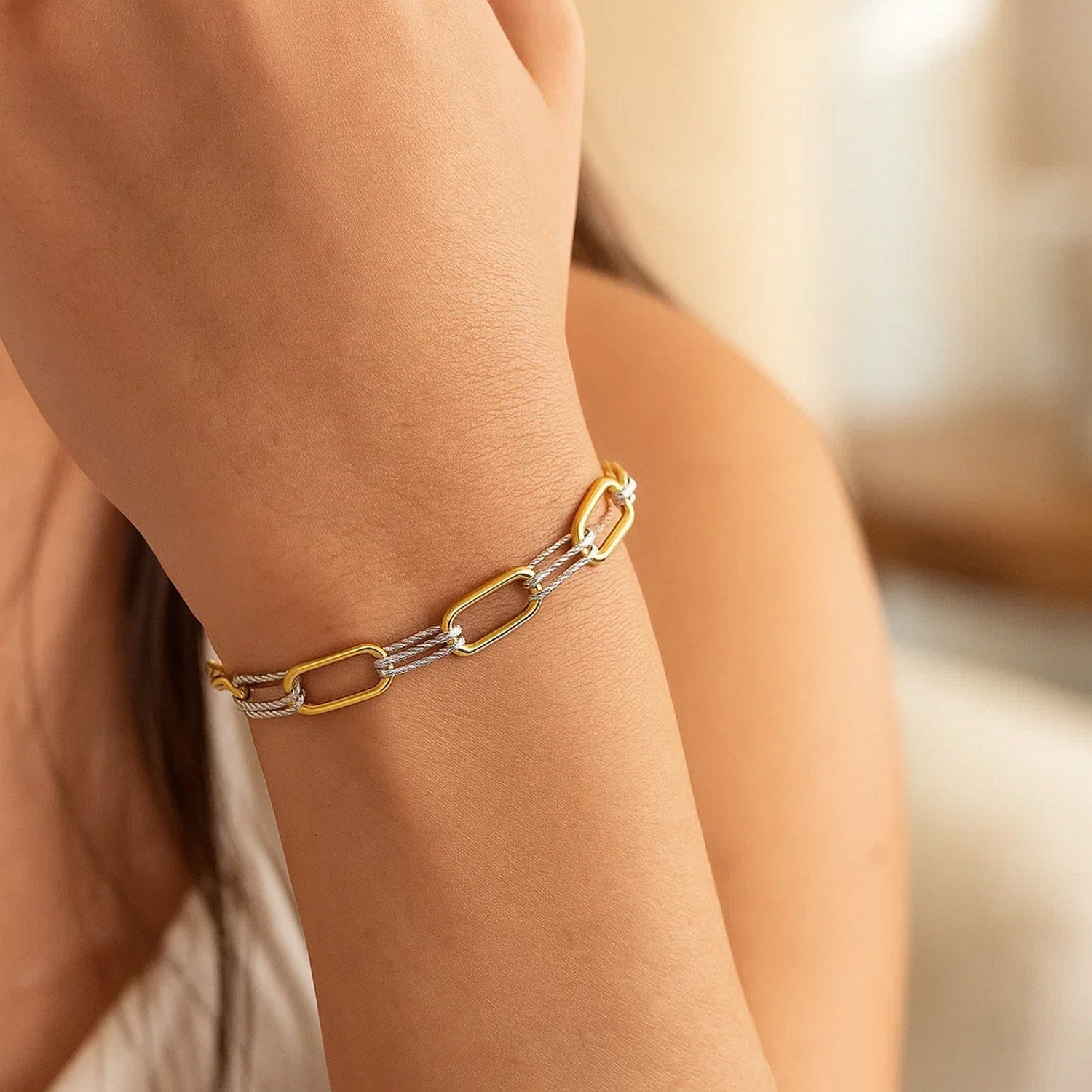 14K two-tone gold diamante paperclip bracelet featuring modern link design and exquisite diamond accents.